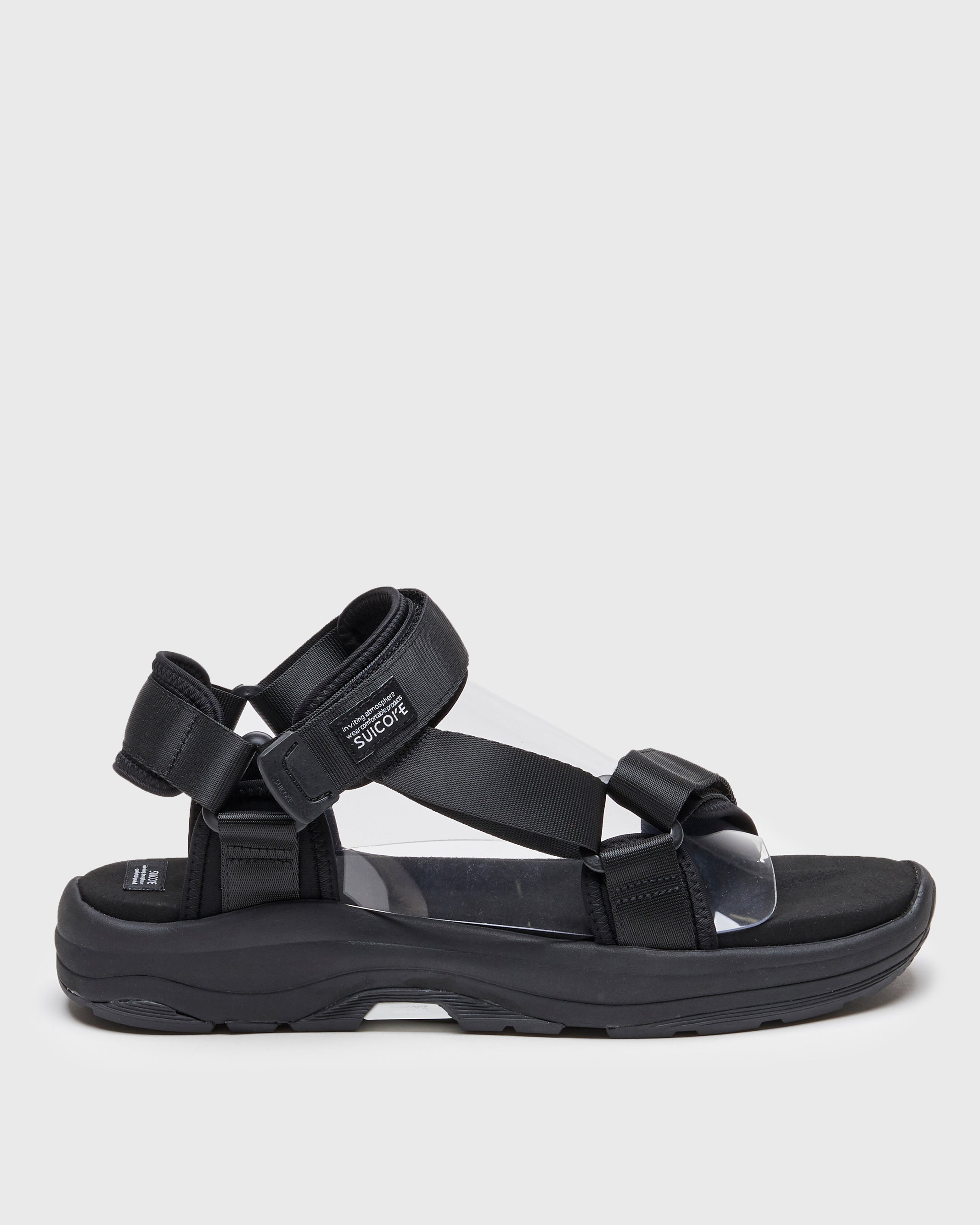 SUICOKE DEPA-Run slides with black nylon upper, black midsole and sole, strap and logo patch. From Spring/Summer 2023 collection on SUICOKE Official US & Canada Webstore. OG-333 BLACK.