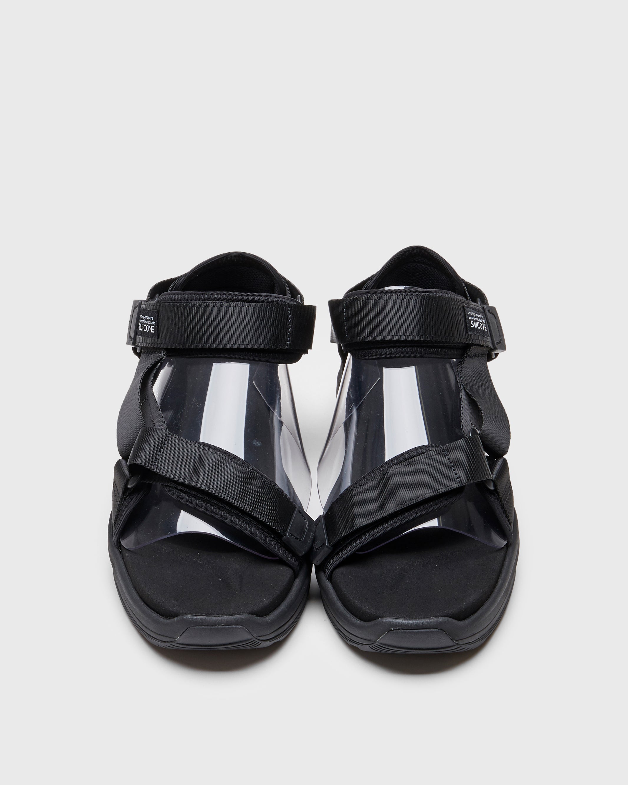 SUICOKE DEPA-Run slides with black nylon upper, black midsole and sole, strap and logo patch. From Spring/Summer 2023 collection on SUICOKE Official US & Canada Webstore. OG-333 BLACK.