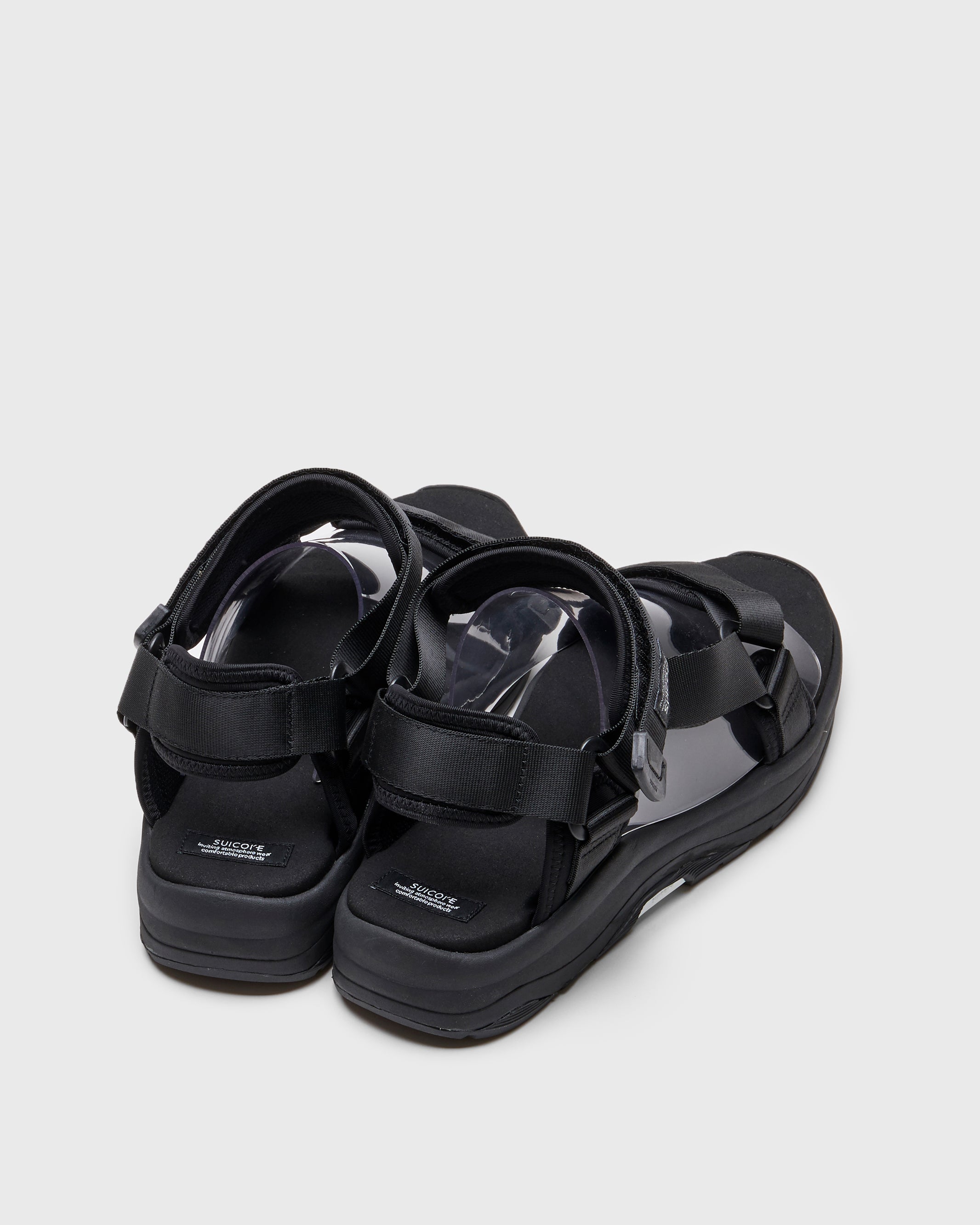 SUICOKE DEPA-Run slides with black nylon upper, black midsole and sole, strap and logo patch. From Spring/Summer 2023 collection on SUICOKE Official US & Canada Webstore. OG-333 BLACK.