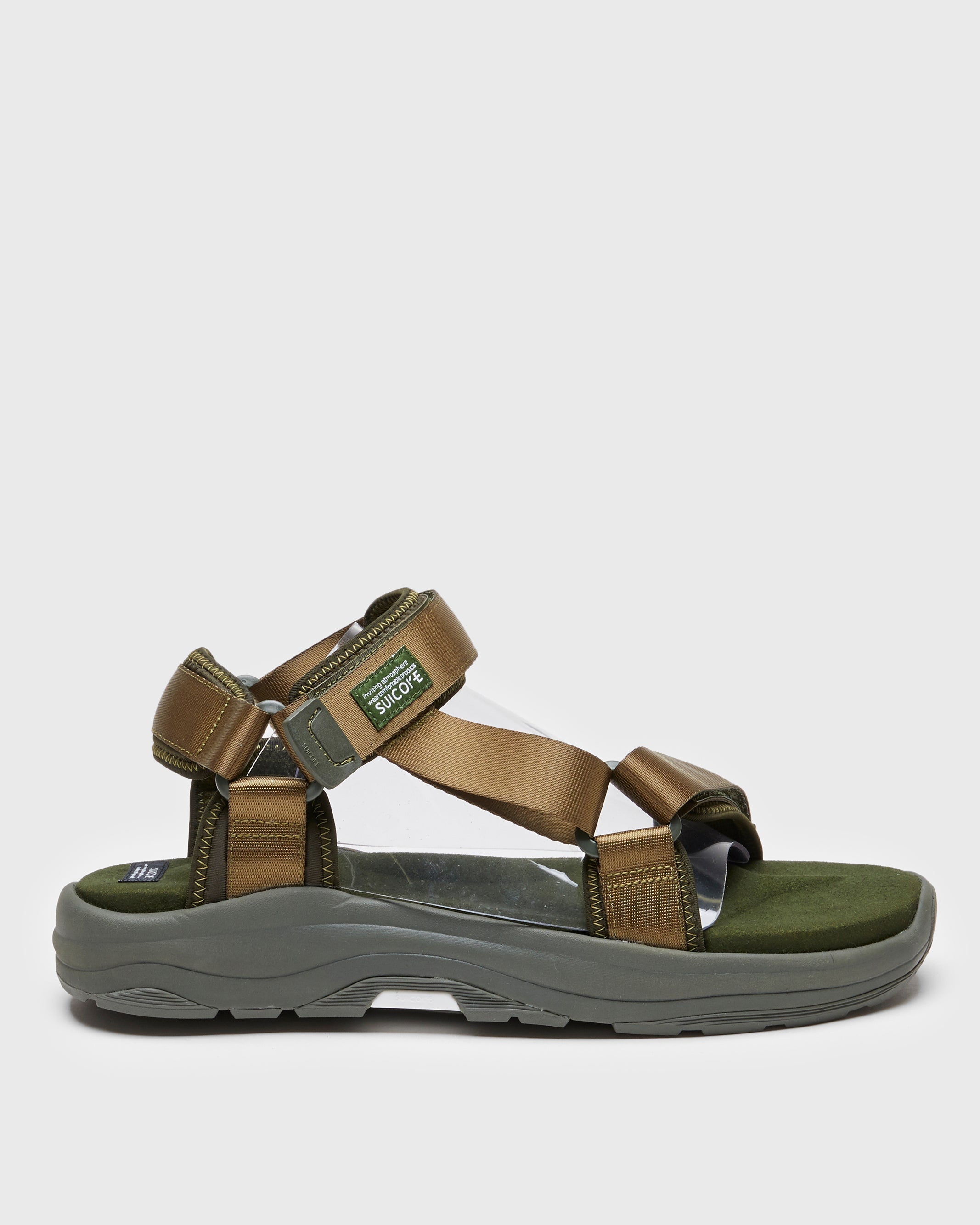 SUICOKE DEPA-Run slides with olive nylon upper, olive midsole and sole, strap and logo patch. From Spring/Summer 2023 collection on SUICOKE Official US & Canada Webstore. OG-333 OLIVE.