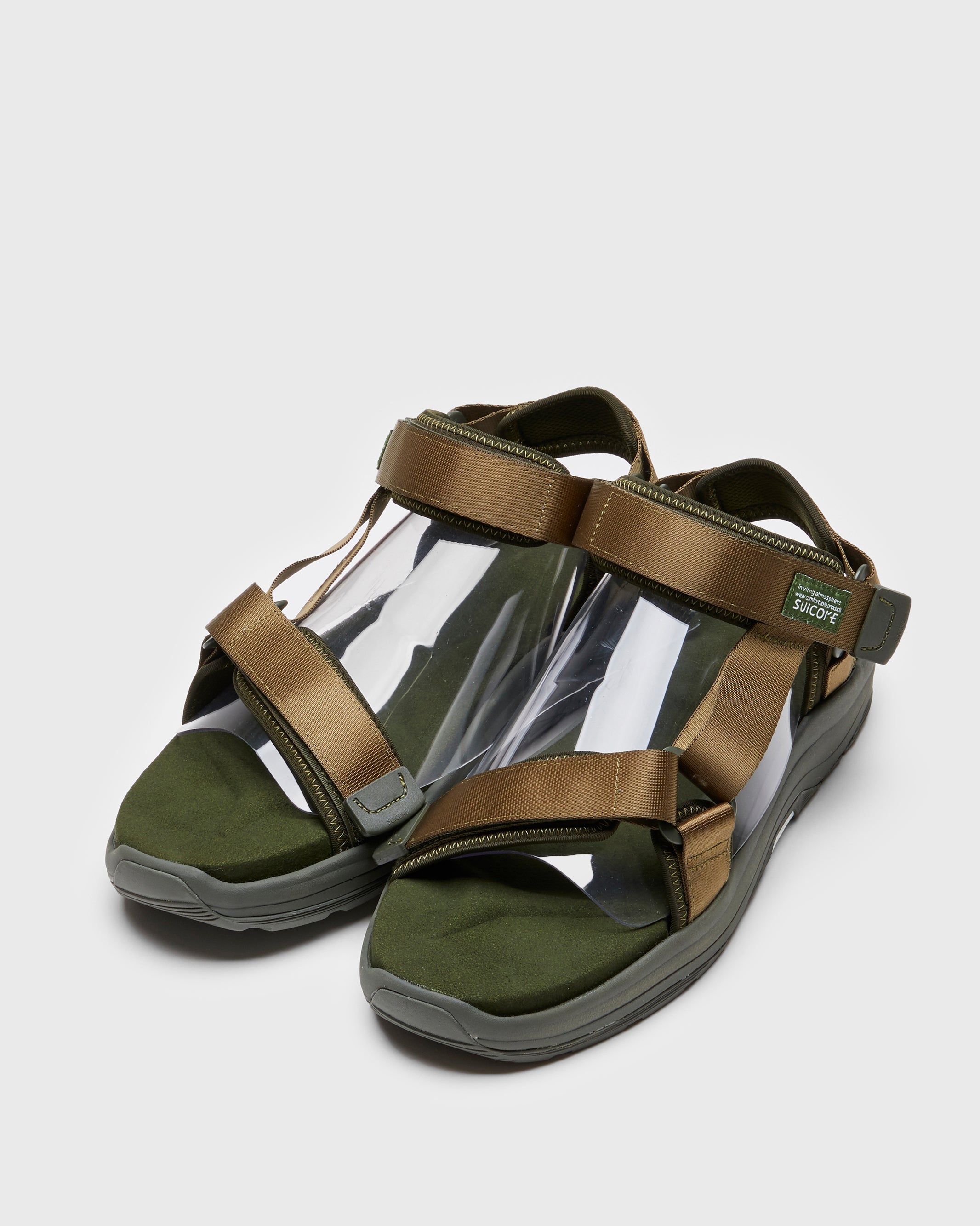 SUICOKE DEPA-Run slides with olive nylon upper, olive midsole and sole, strap and logo patch. From Spring/Summer 2023 collection on SUICOKE Official US & Canada Webstore. OG-333 OLIVE.