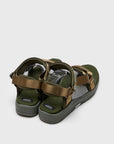 SUICOKE DEPA-Run slides with olive nylon upper, olive midsole and sole, strap and logo patch. From Spring/Summer 2023 collection on SUICOKE Official US & Canada Webstore. OG-333 OLIVE.