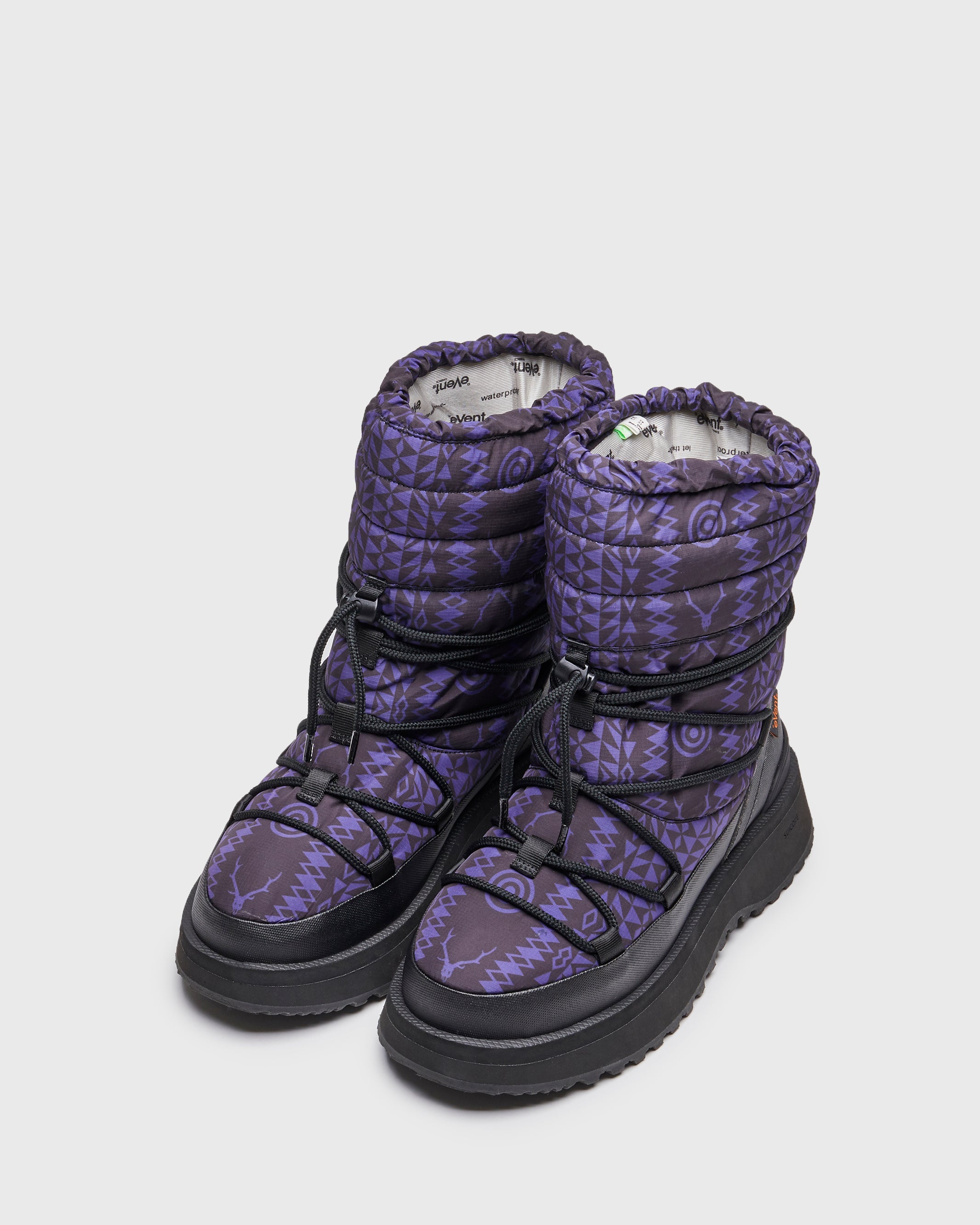 SOUTH2 WEST8 x SUICOKE BOWER high lace boots with black pattern printed upper with original SOUTH2 WEST8 design and black midsole and sole. From Fall Winter 2023 collection on SUICOKE Official US & Canada Webstore. OG-340EVAB-S2W8 BLACK