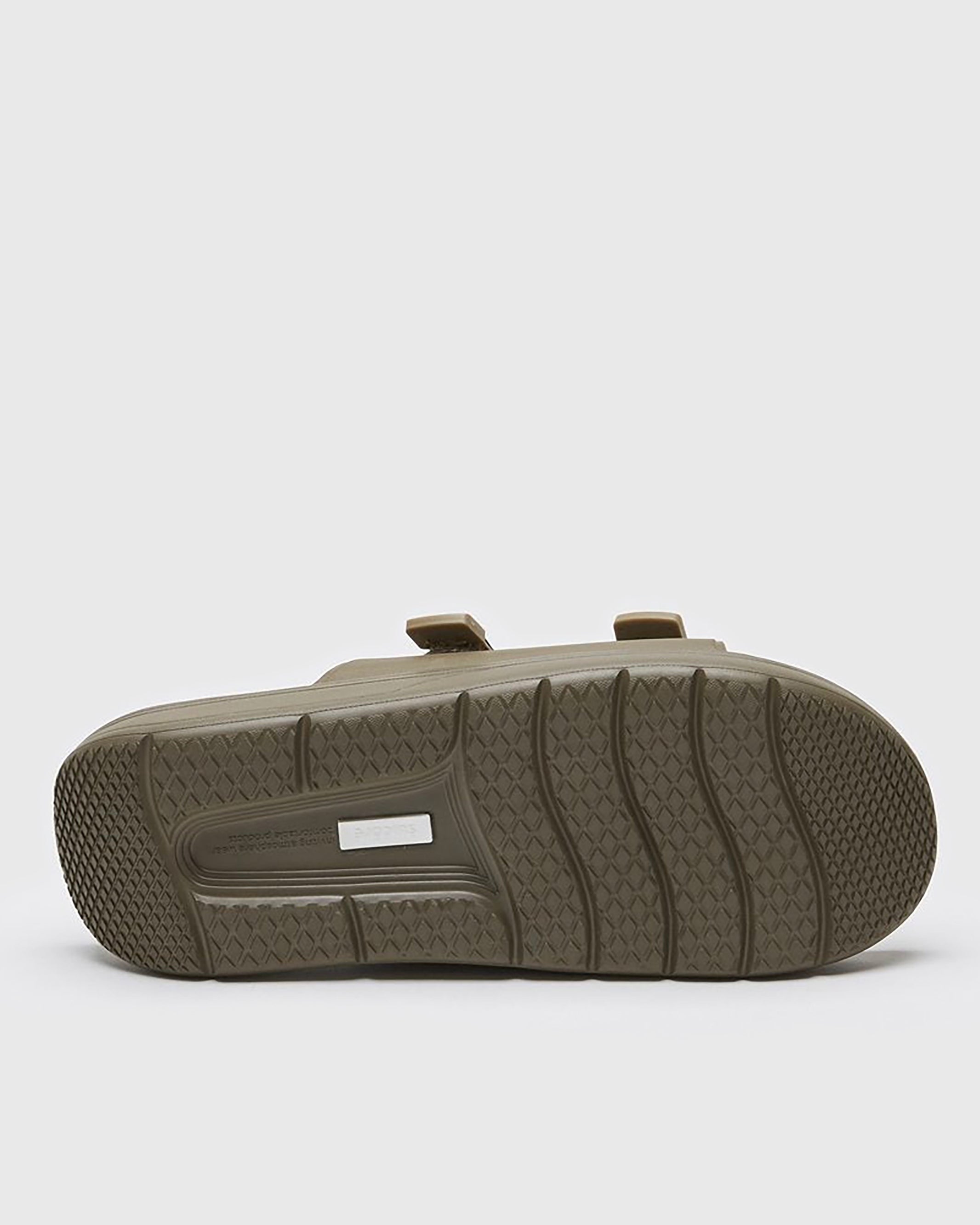 SUICOKE URICH slides with olive rubber upper, olive midsole and sole, straps and logo patch. From Spring/Summer 2022 collection on SUICOKE Official US & Canada Webstore. OG-INJ-01 OLIVE