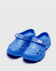 SUICOKE MOK slides with blue rubber upper, blue midsole and sole, straps and logo patch. From Spring/Summer 2023 collection on SUICOKE Official US & Canada Webstore. OG-INJ101 BLUE