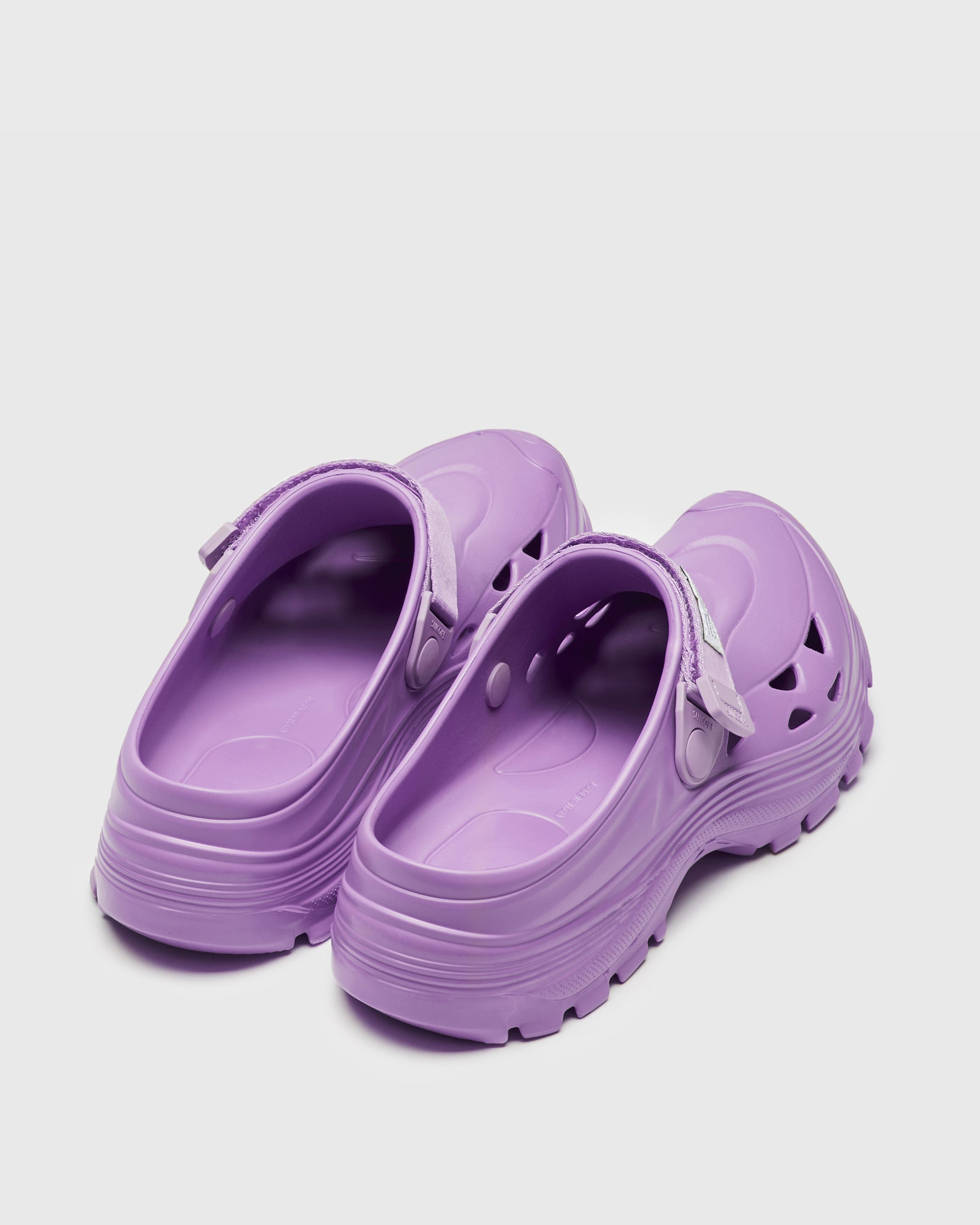 SUICOKE MOK slides with purple rubber upper, purple midsole and sole, straps and logo patch. From Spring/Summer 2023 collection on SUICOKE Official US & Canada Webstore. OG-INJ101 PURPLE