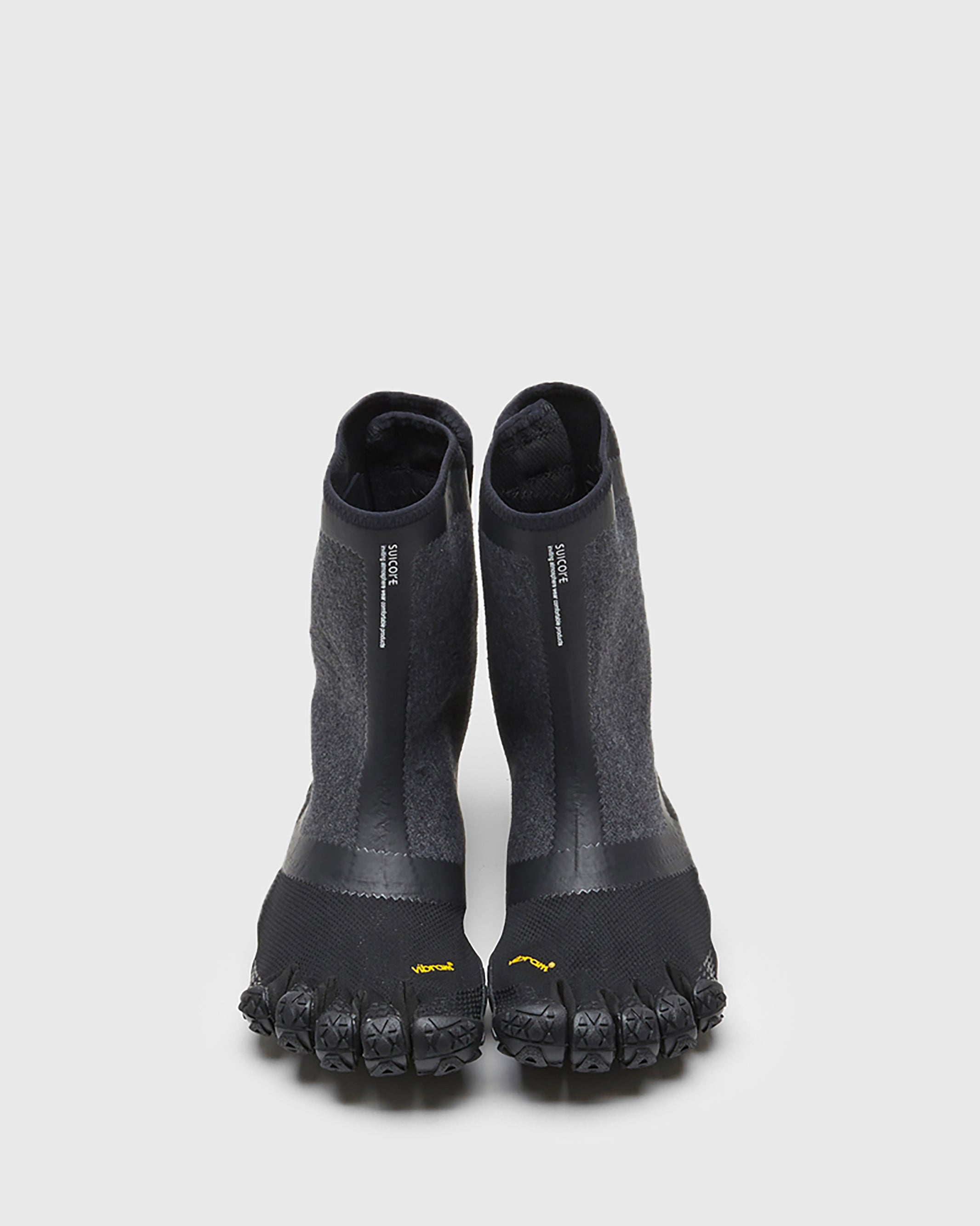 SUICOKE NIN-HI sneakers with black nylon upper, black midsole and sole, and logo patch. From Spring/Summer 2023 collection on SUICOKE Official US & Canada Webstore. S20MHC1 BLACK