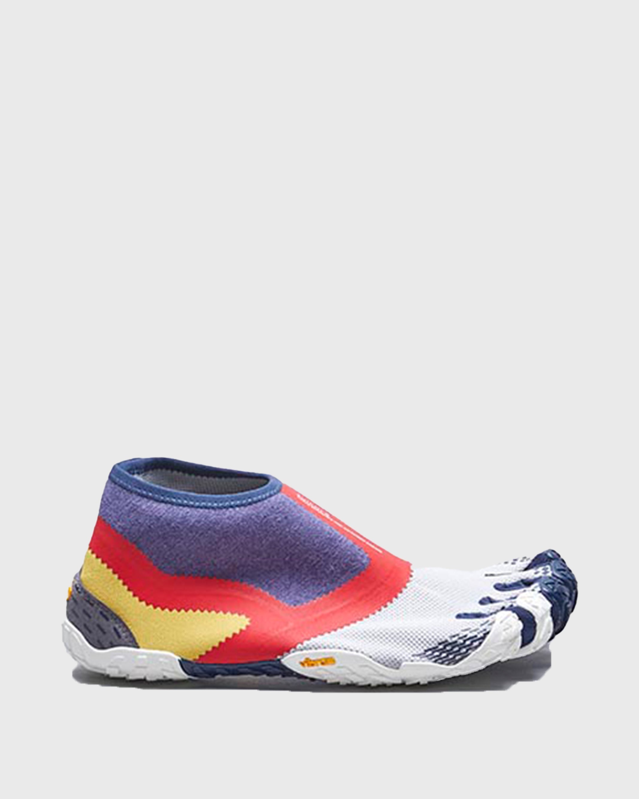 SUICOKE NIN-LO sneakers with navy & red nylon upper, navy & red midsole and sole, and logo patch. From Spring/Summer 2023 collection on SUICOKE Official US & Canada Webstore. S20MLC2 NAVY X RED