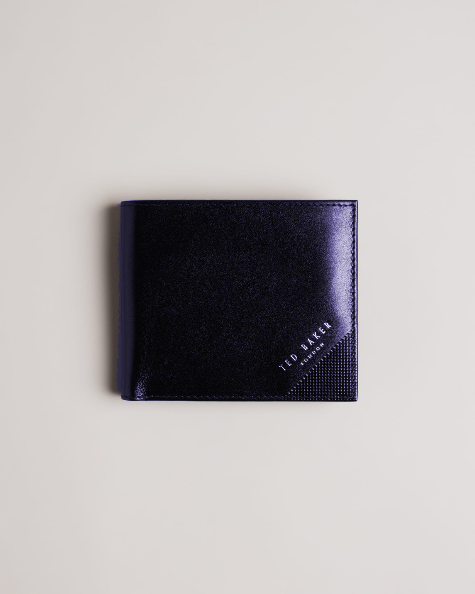 Ted Baker Prugs Embossed Corner Bifold Coin Wallet in Navy 267038 | Shop from eightywingold an official brand partner for Ted Baker in Canada and US.