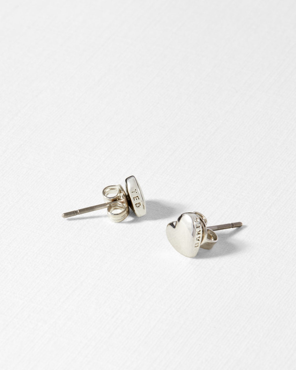 Harly Tiny Heart Stud Earring in Silver | eightywingold - official partner of Ted Baker