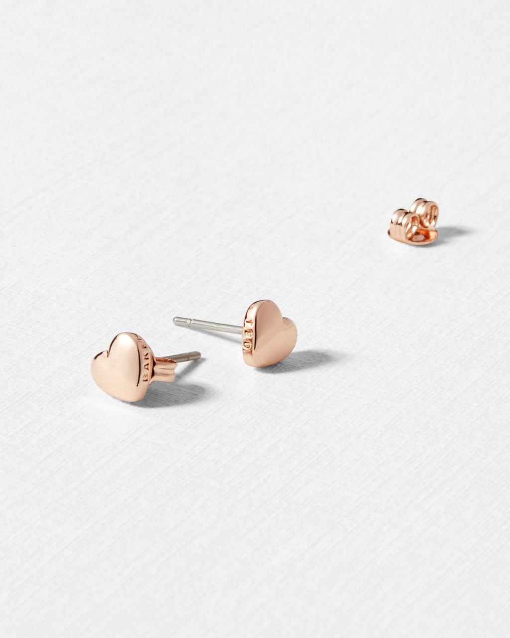 Harly Tiny Heart Stud Earring in Rose Gold | eightywingold - official partner of Ted Baker