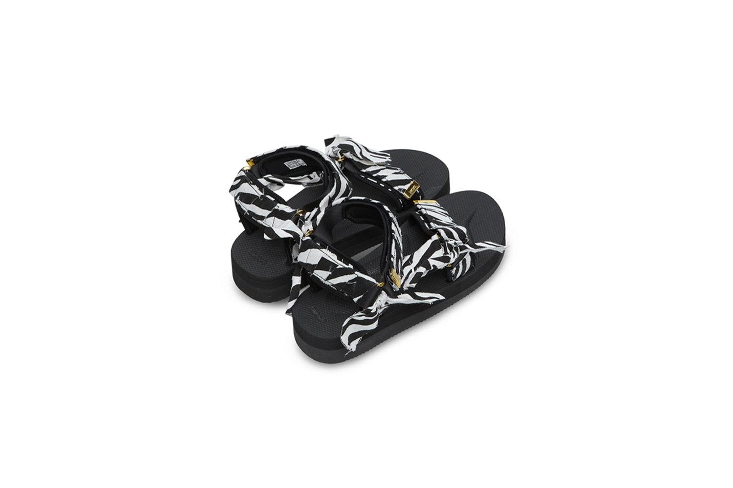 SUICOKE Depa-Fbcpocab-A black platform sandal with zebra printed straps + gold hardware logo tips. From SUICOKE SS21 collection.