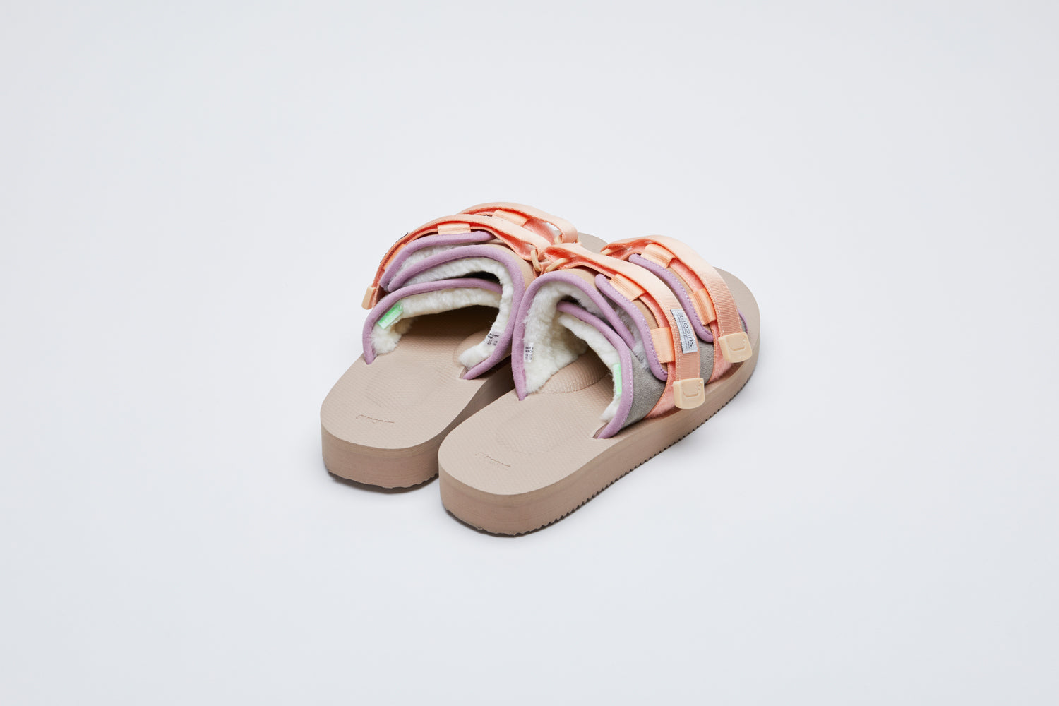 SUICOKE MOTO-Mab suede slides with beige midsole and sole, gray suede upper and shearling inside with light purple piping and light pink nylon straps. From Fall/Winter 2021 collection on SUICOKE Official US &amp; Canada Webstore.