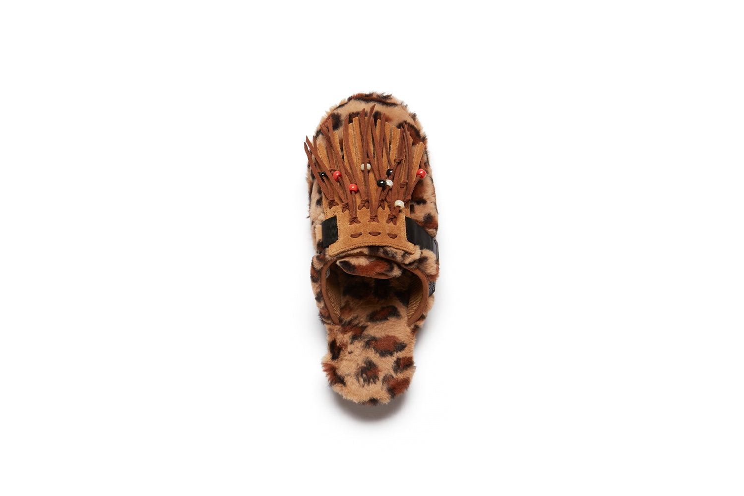 Alanui edition SUICOKE Zavo closed toe slides with leopard spotted colored fur on the upper and footbed on a black sole. Includes a dark and light brown suede-beaded fringe that is a detachable piece from the singular nylon strap across the upper. From Fall/Winter 2021 collection on SUICOKE Official US & Canada Webstore.
