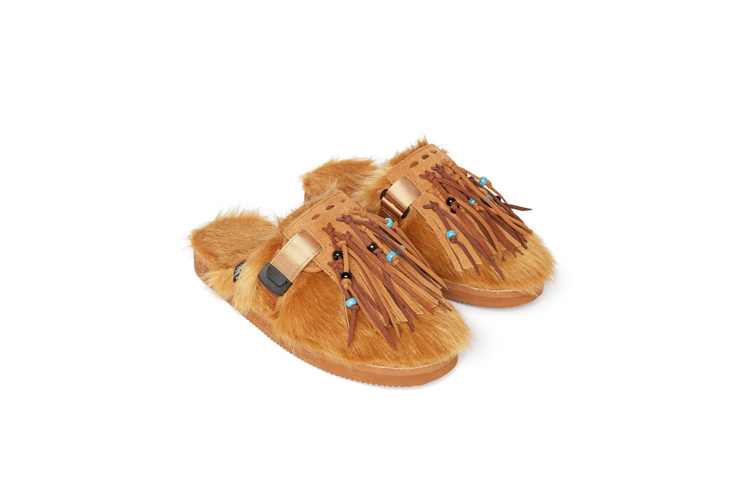 Alanui edition SUICOKE Zavo closed toe slides with camel colored fur on the upper and footbed. Includes a dark and light brown suede-beaded fringe that is a detachable piece from the singular nylon strap across the upper. From Fall/Winter 2021 collection on SUICOKE Official US &amp; Canada Webstore.