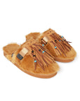 Alanui edition SUICOKE Zavo closed toe slides with camel colored fur on the upper and footbed. Includes a dark and light brown suede-beaded fringe that is a detachable piece from the singular nylon strap across the upper. From Fall/Winter 2021 collection on SUICOKE Official US & Canada Webstore.
