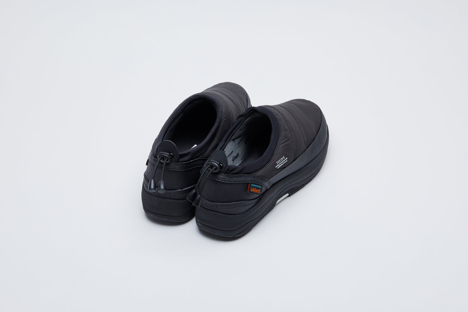 SUICOKE PEPPER-evab low top ankle boots with black nylon upper and running sole with adjustable toggle cord closure. From Fall/Winter 2021 collection on SUICOKE Official US & Canada Webstore.