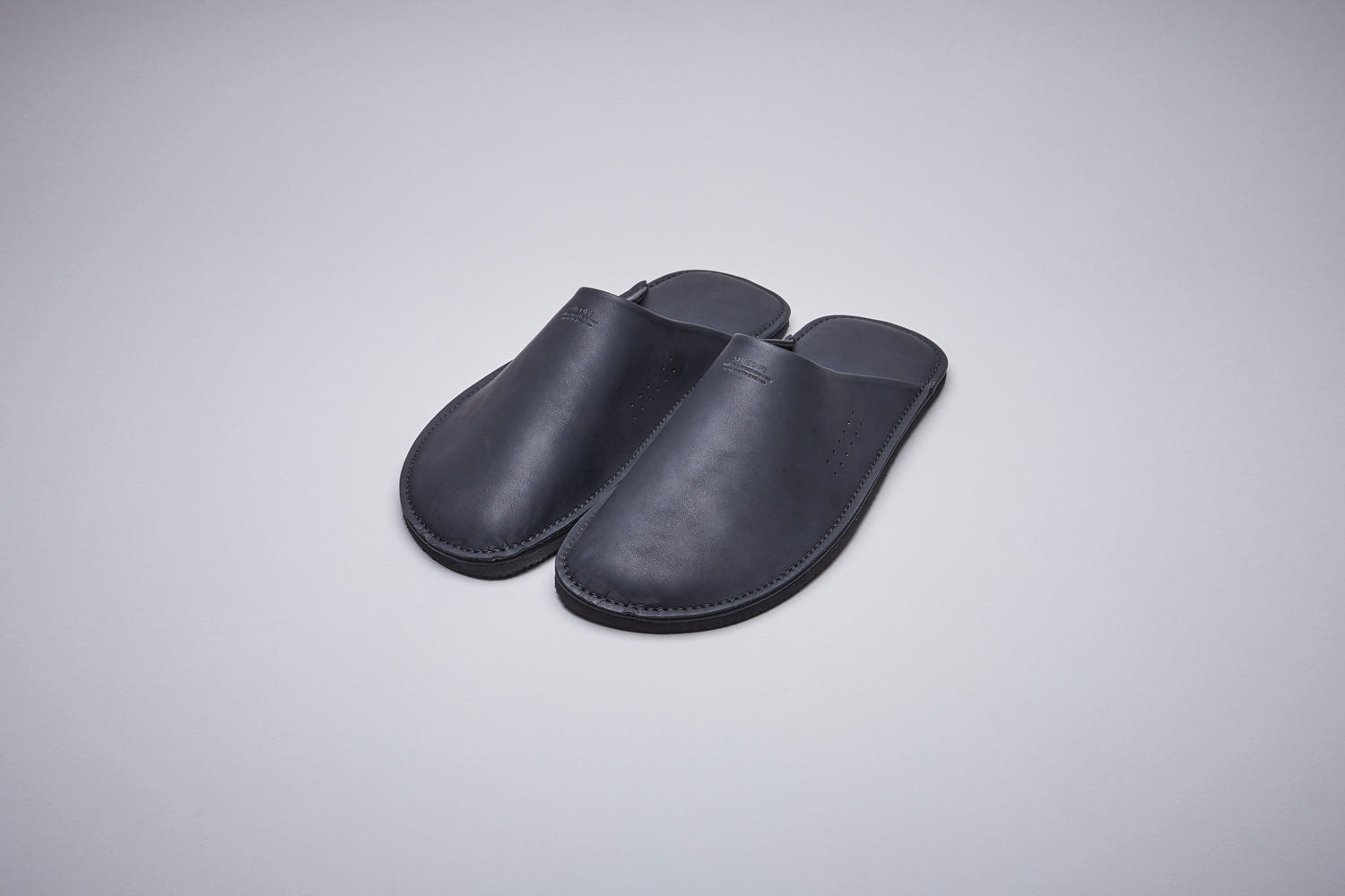 SUICOKE LIPPER slides with PU Leather upper, beige flat-type original sole. From Fall/Winter 2021 collection on SUICOKE Official US & Canada Webstore.