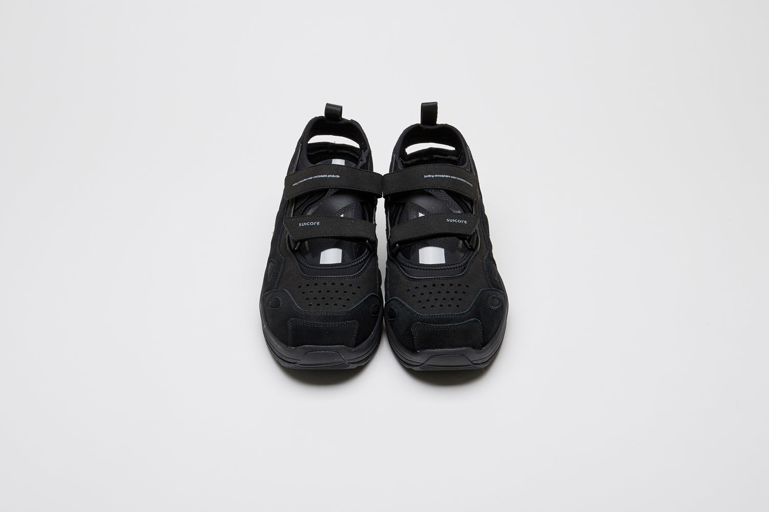 SUICOKE AKK-ab shoes with black cow suede and nylon upper, black midsole and sole, straps and logo patch. From Spring/Summer 2022 collection on SUICOKE Official US &amp; Canada Webstore.