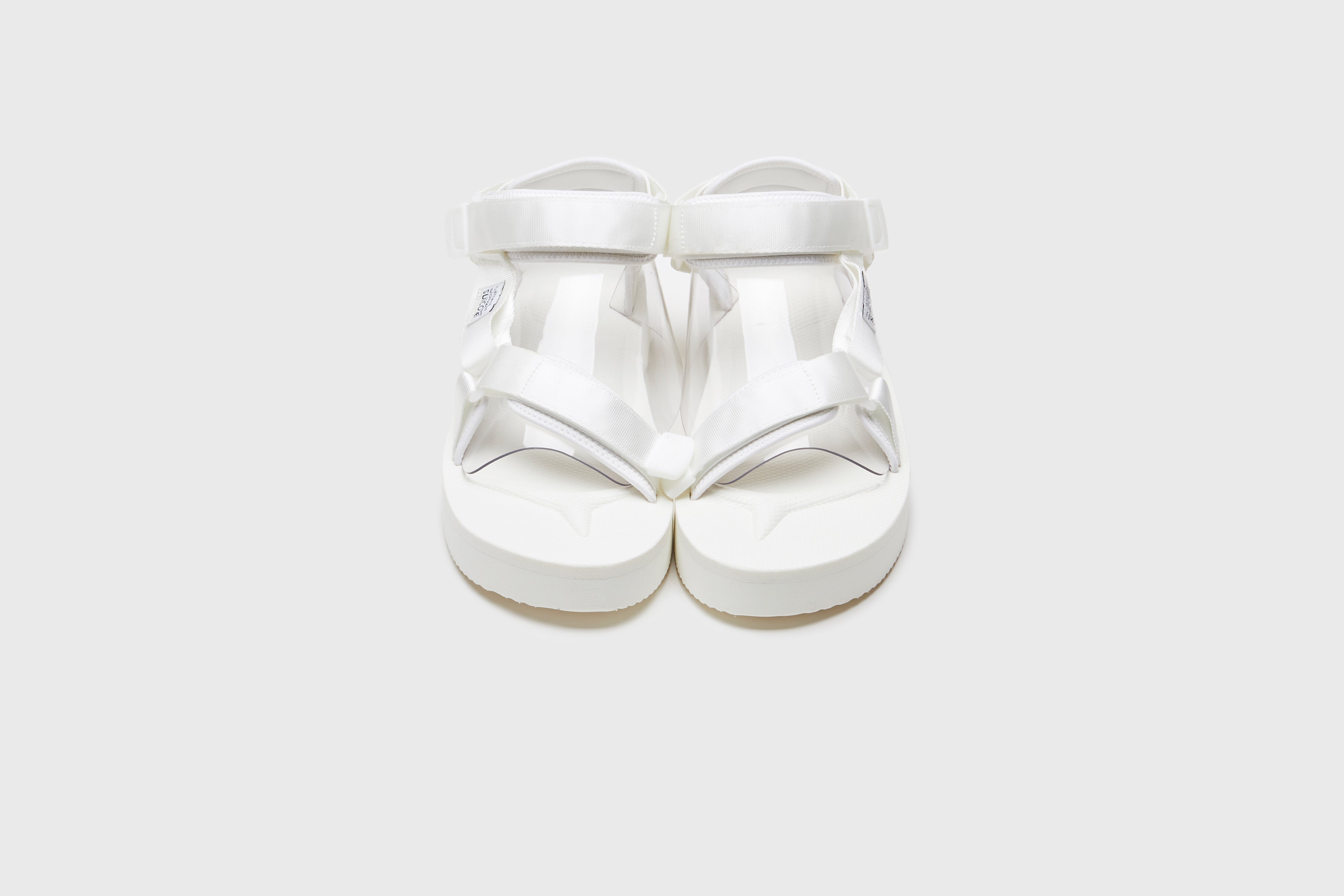 SUICOKE DEPA-2PO sandals with white nylon upper, white midsole and sole, strap and logo patch. From Spring/Summer 2023 collection on eightywingold Web Store, an official partner of SUICOKE. OG-022-2PO WHITE