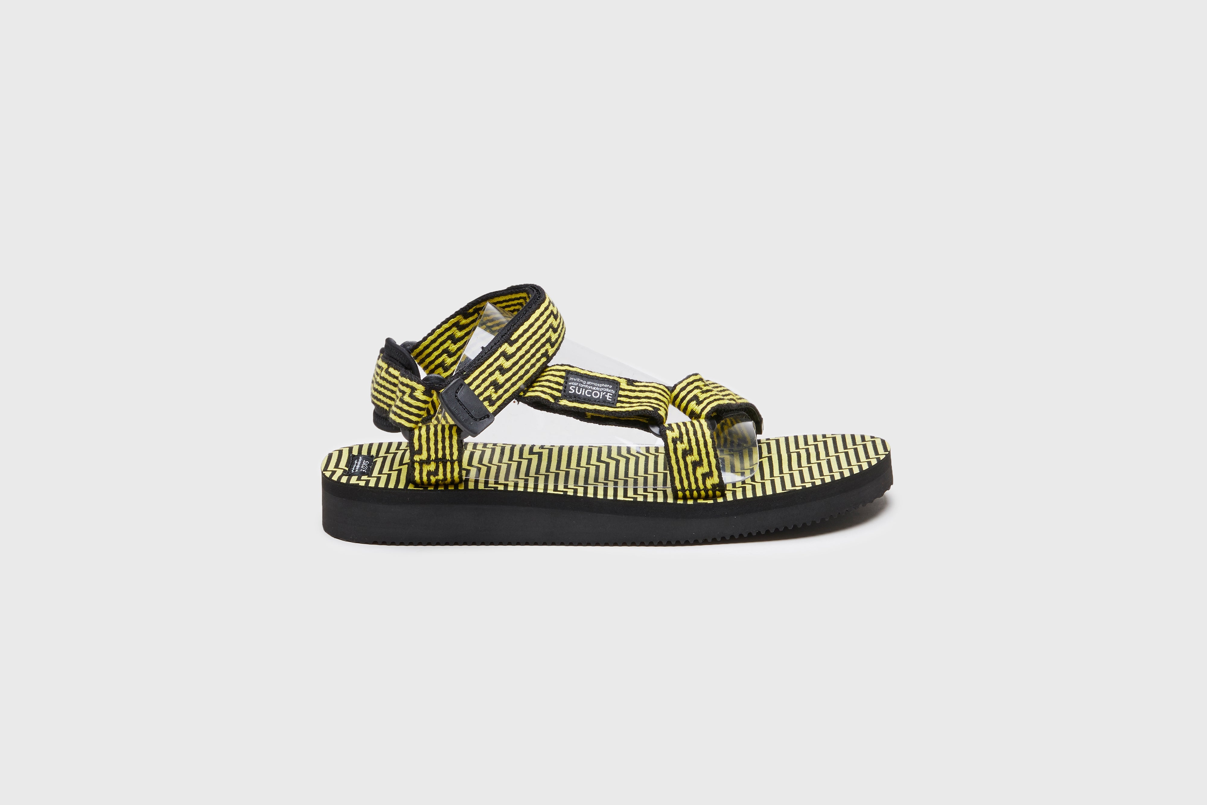 SUICOKE DEPA-JC01 sandals with black & yellow nylon upper, black & yellow midsole and sole, strap and logo patch. From Spring/Summer 2023 collection on eightywingold Web Store, an official partner of SUICOKE. OG-022-JC01 BLACK X YELLOW