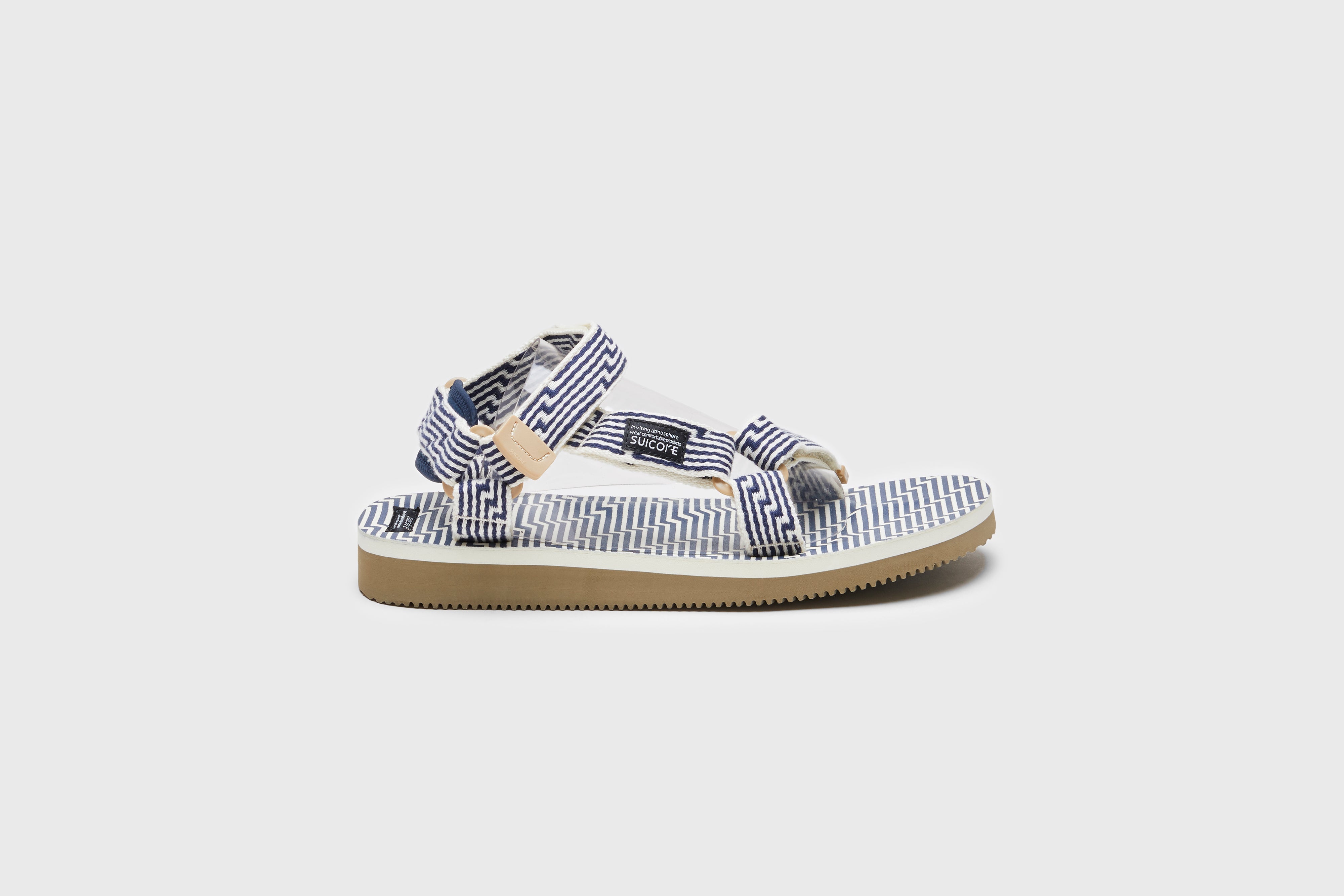 SUICOKE DEPA-JC01 sandals with ivory &amp; navy nylon upper, ivory &amp; navy midsole and sole, strap and logo patch. From Spring/Summer 2023 collection on eightywingold Web Store, an official partner of SUICOKE. OG-022-JC01 IVORY X NAVY