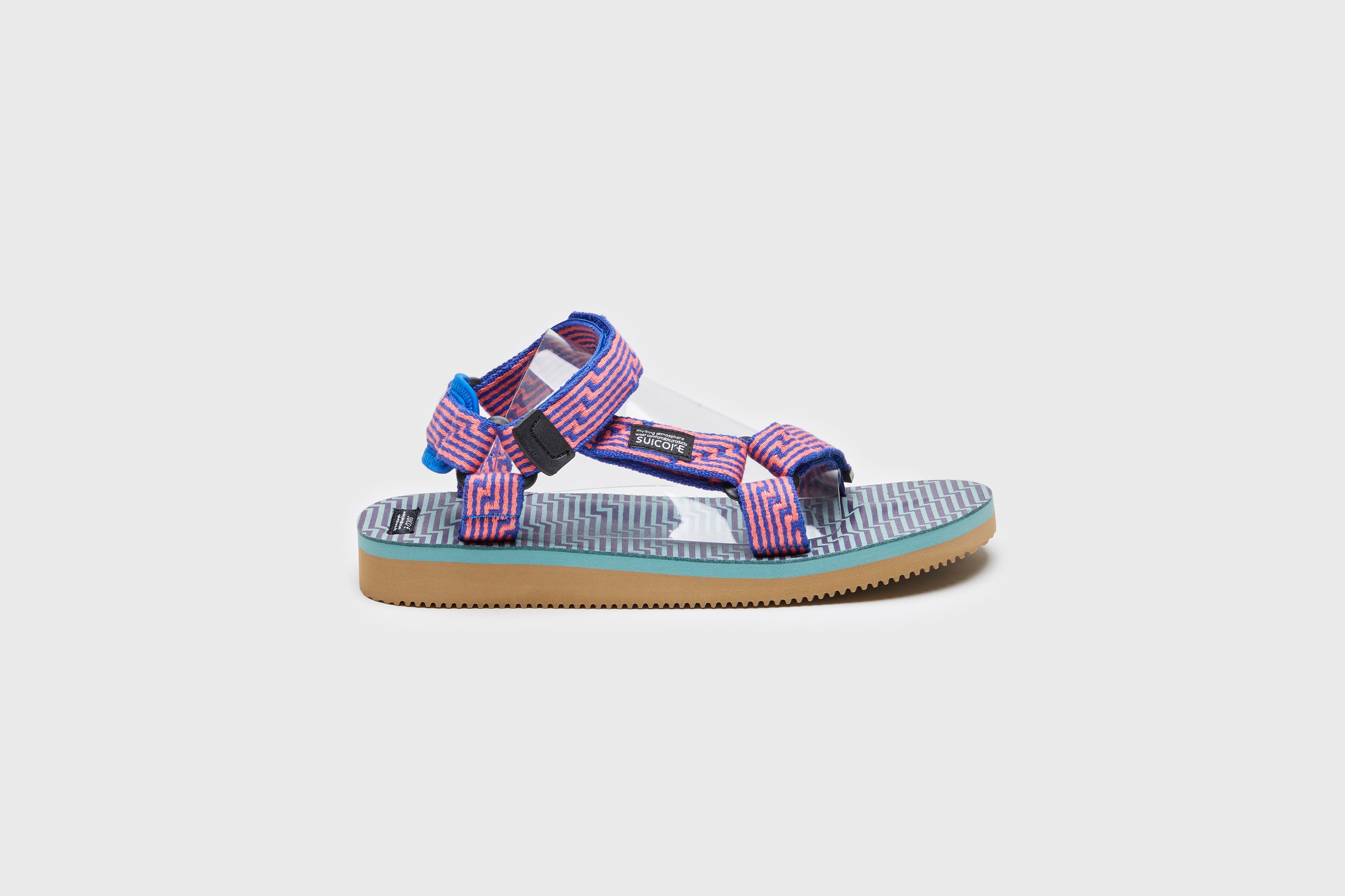 SUICOKE DEPA-JC01 sandals with orange &amp; blue nylon upper, orange &amp; blue midsole and sole, strap and logo patch. From Spring/Summer 2023 collection on eightywingold Web Store, an official partner of SUICOKE. OG-022-JC01 ORANGE X BLUE