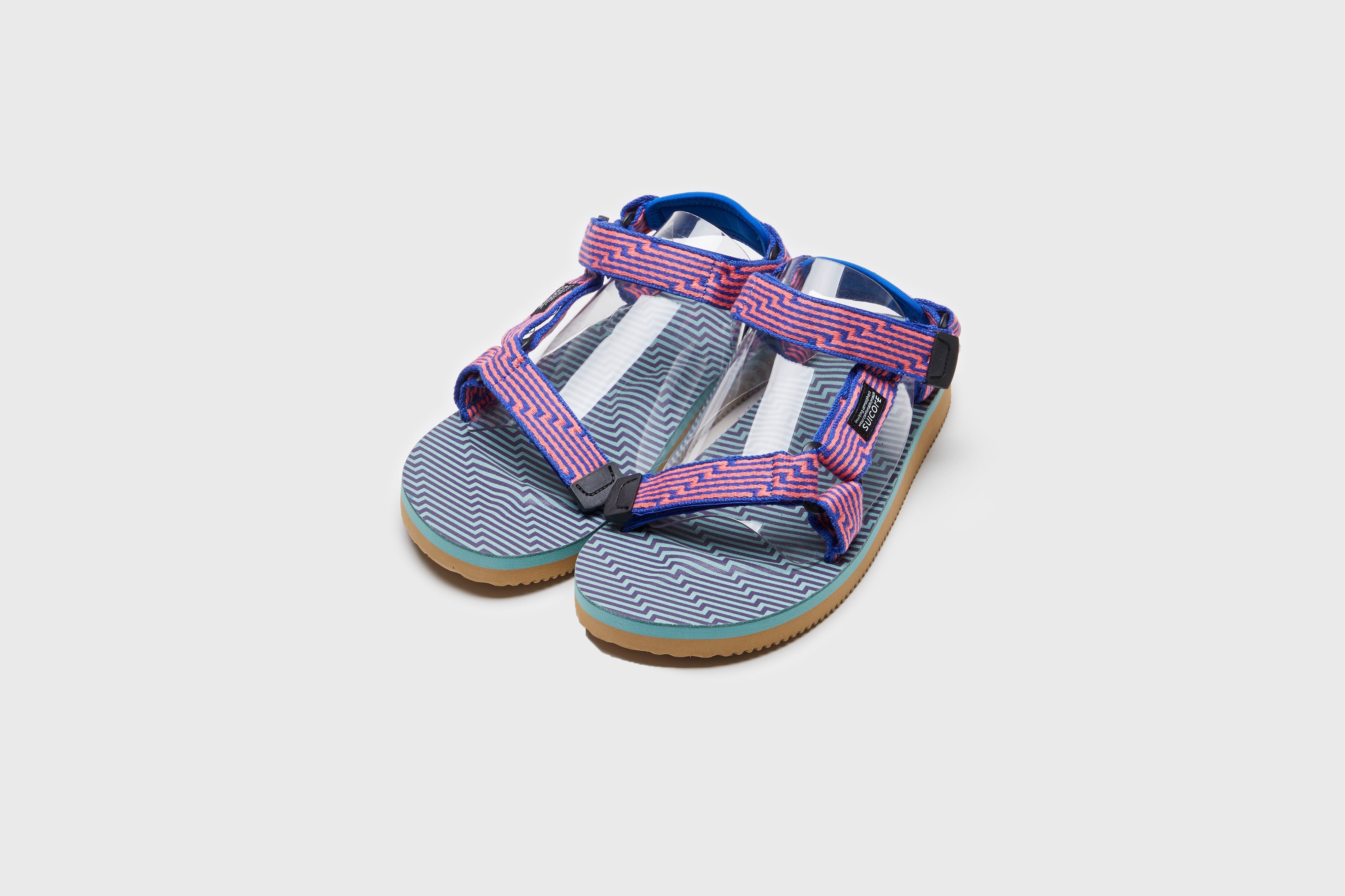 SUICOKE DEPA-JC01 sandals with orange &amp; blue nylon upper, orange &amp; blue midsole and sole, strap and logo patch. From Spring/Summer 2023 collection on eightywingold Web Store, an official partner of SUICOKE. OG-022-JC01 ORANGE X BLUE