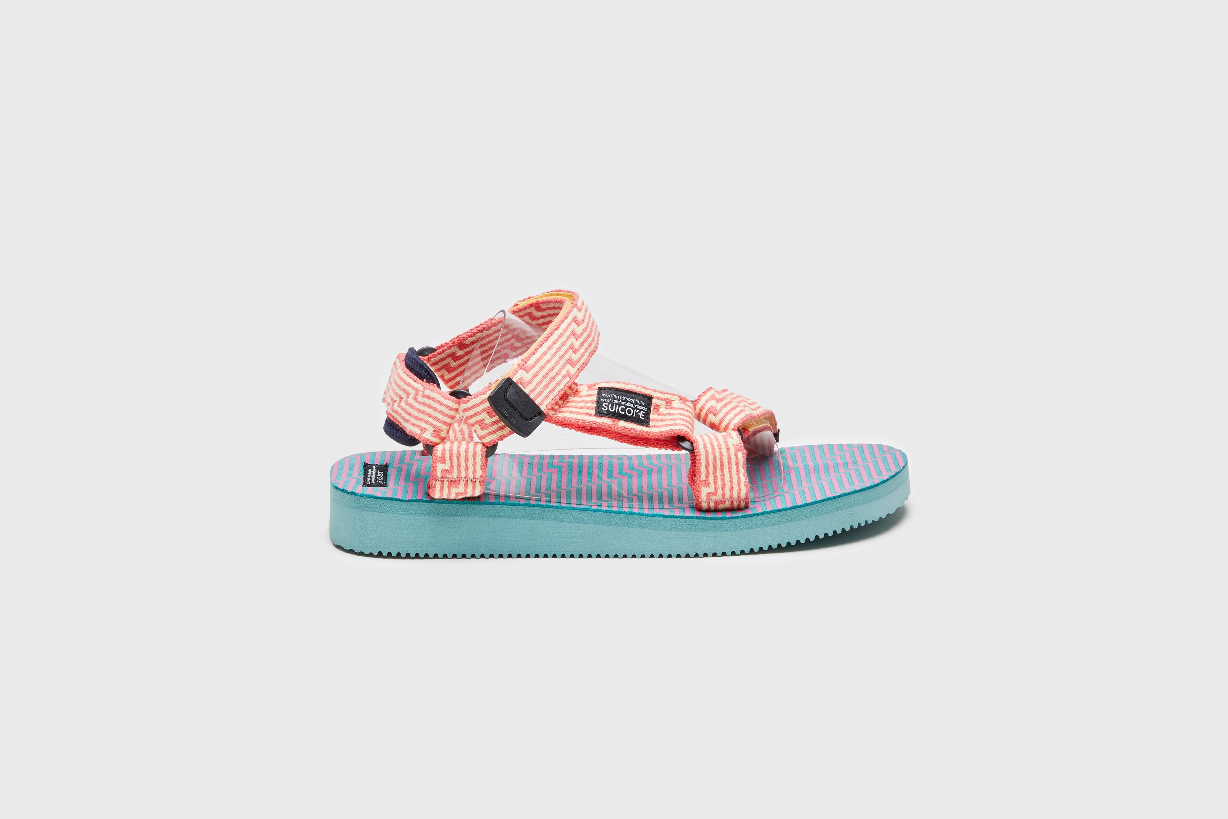 SUICOKE DEPA-JC01 sandals with yellow & pink nylon upper, yellow & pink midsole and sole, strap and logo patch. From Spring/Summer 2023 collection on eightywingold Web Store, an official partner of SUICOKE. OG-022-JC01 YELLOW X PINK