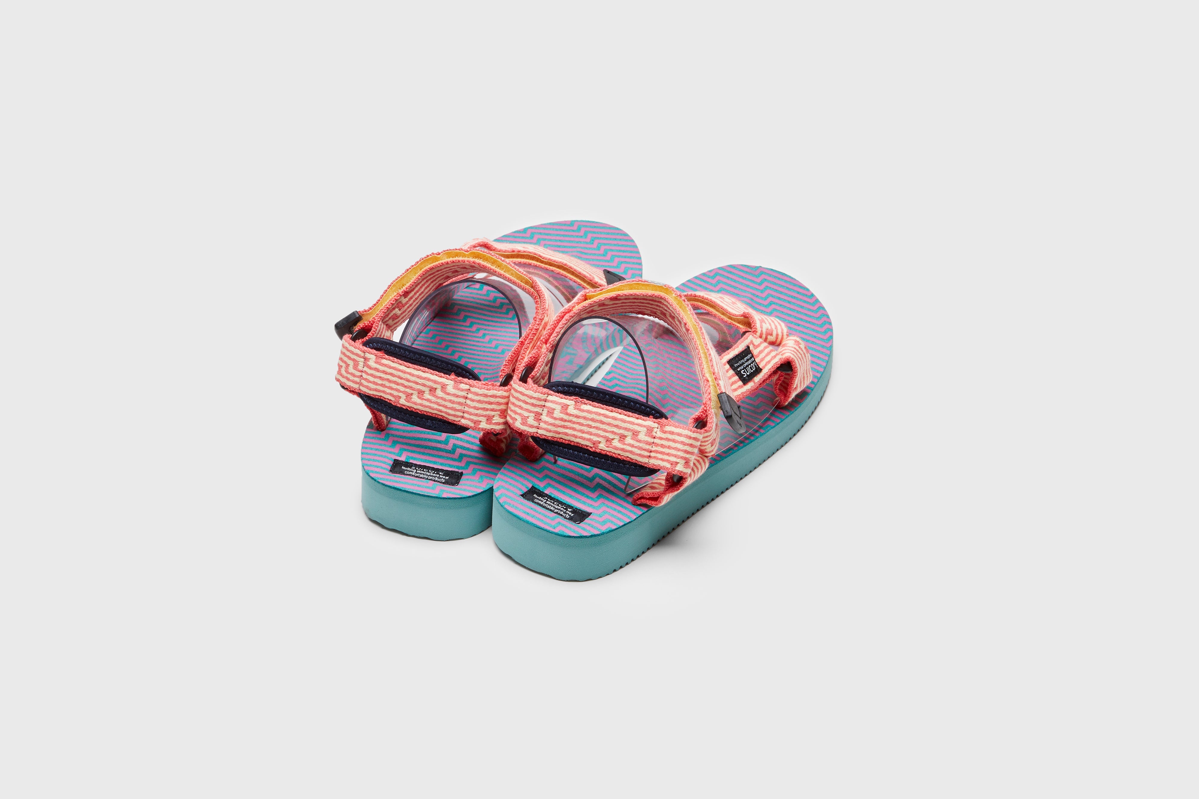 SUICOKE DEPA-JC01 sandals with yellow &amp; pink nylon upper, yellow &amp; pink midsole and sole, strap and logo patch. From Spring/Summer 2023 collection on eightywingold Web Store, an official partner of SUICOKE. OG-022-JC01 YELLOW X PINK