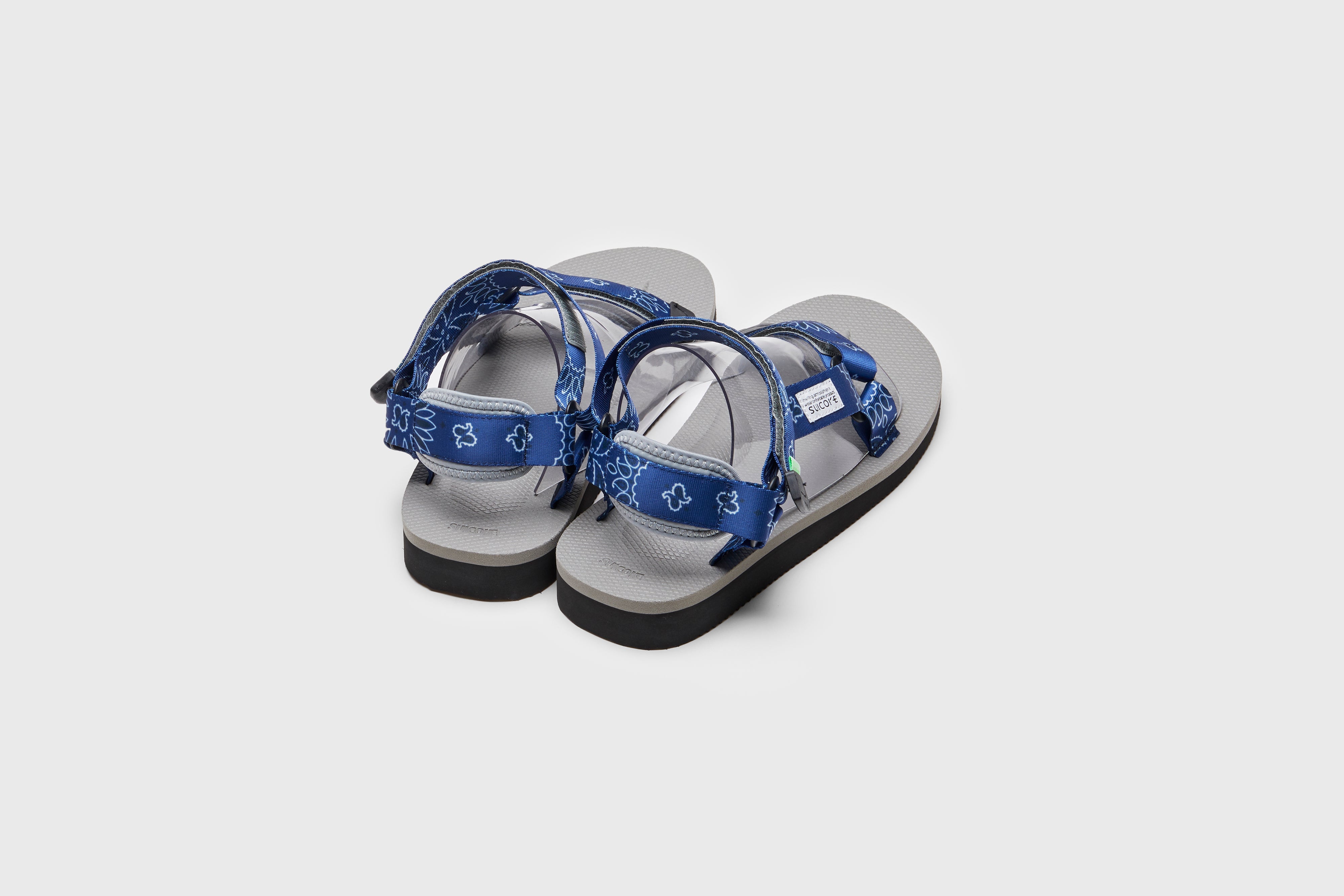 SUICOKE DEPA-Cab-PT05 sandals with navy &amp; Gray nylon upper, navy &amp; gray midsole and sole, strap and logo patch. From Spring/Summer 2023 collection on eightywingold Web Store, an official partner of SUICOKE. OG-022CAB-PT05 NAVY X GRAY