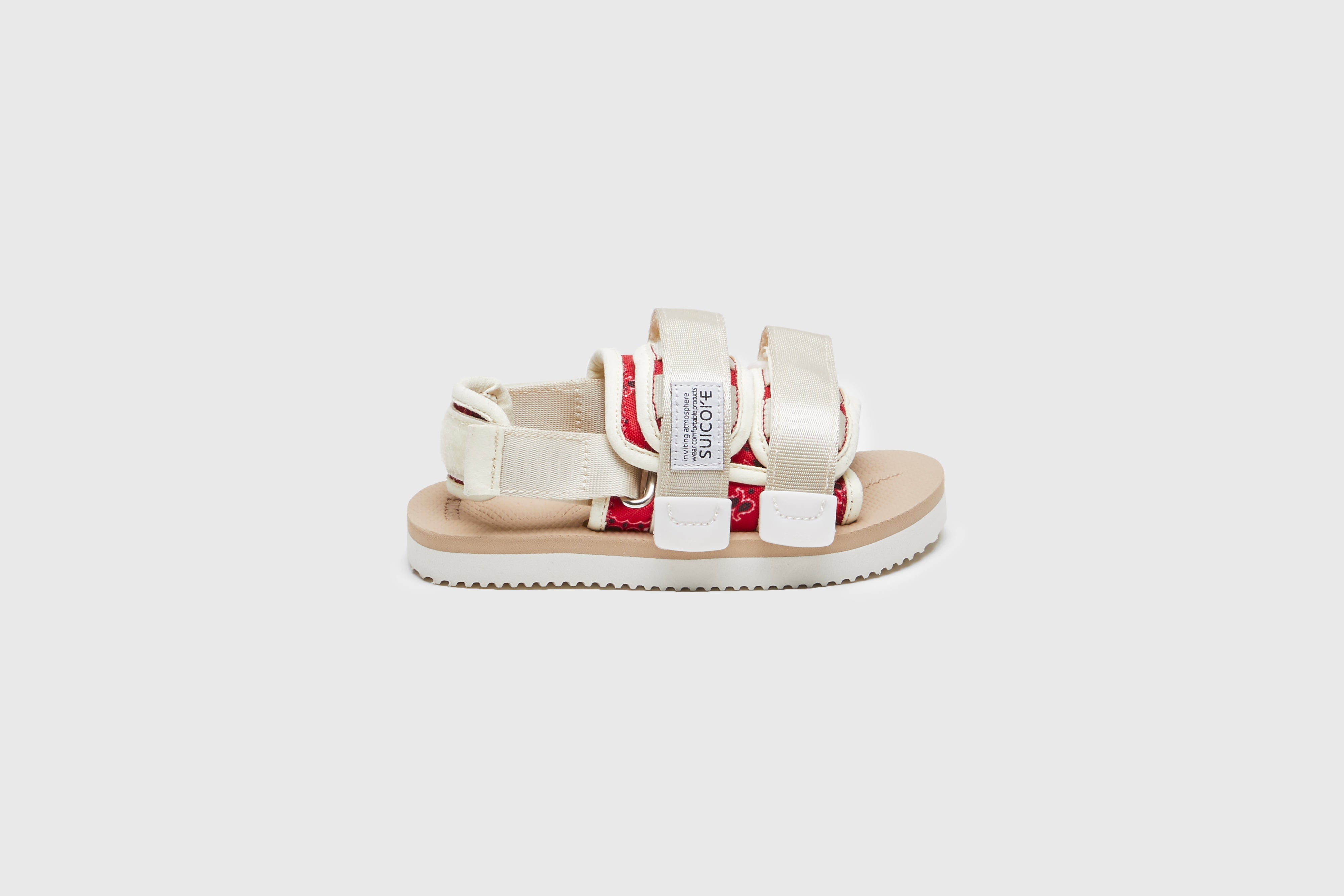 SUICOKE MOTO-2kids-PT05 slides with red &amp; beige nylon upper, red &amp; beige midsole and sole, strap and logo patch. From Spring/Summer 2023 collection on eightywingold Web Store, an official partner of SUICOKE. OG-056-2KIDS-PT05 RED X BEIGE
