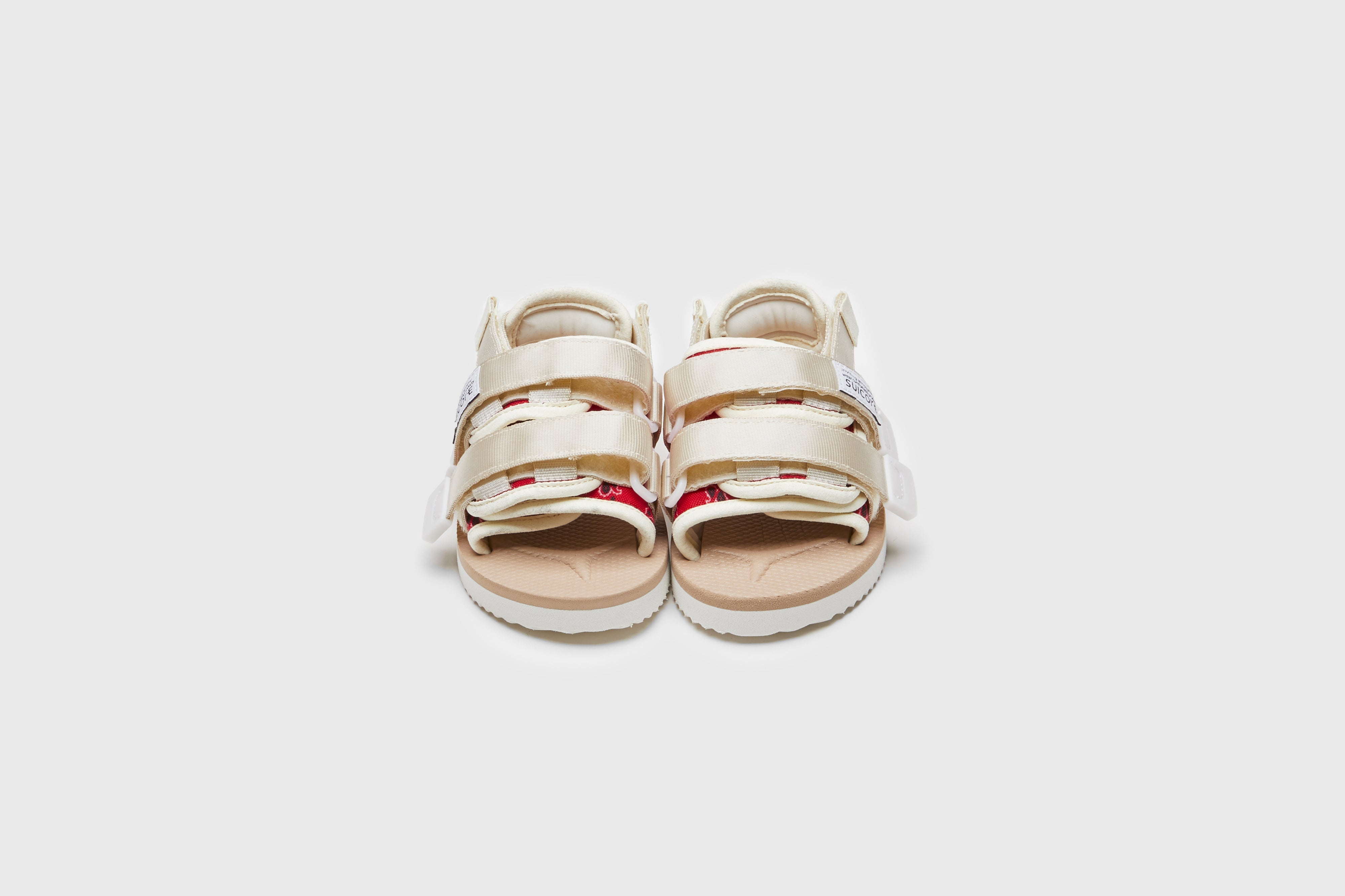 SUICOKE MOTO-2kids-PT05 slides with red &amp; beige nylon upper, red &amp; beige midsole and sole, strap and logo patch. From Spring/Summer 2023 collection on eightywingold Web Store, an official partner of SUICOKE. OG-056-2KIDS-PT05 RED X BEIGE
