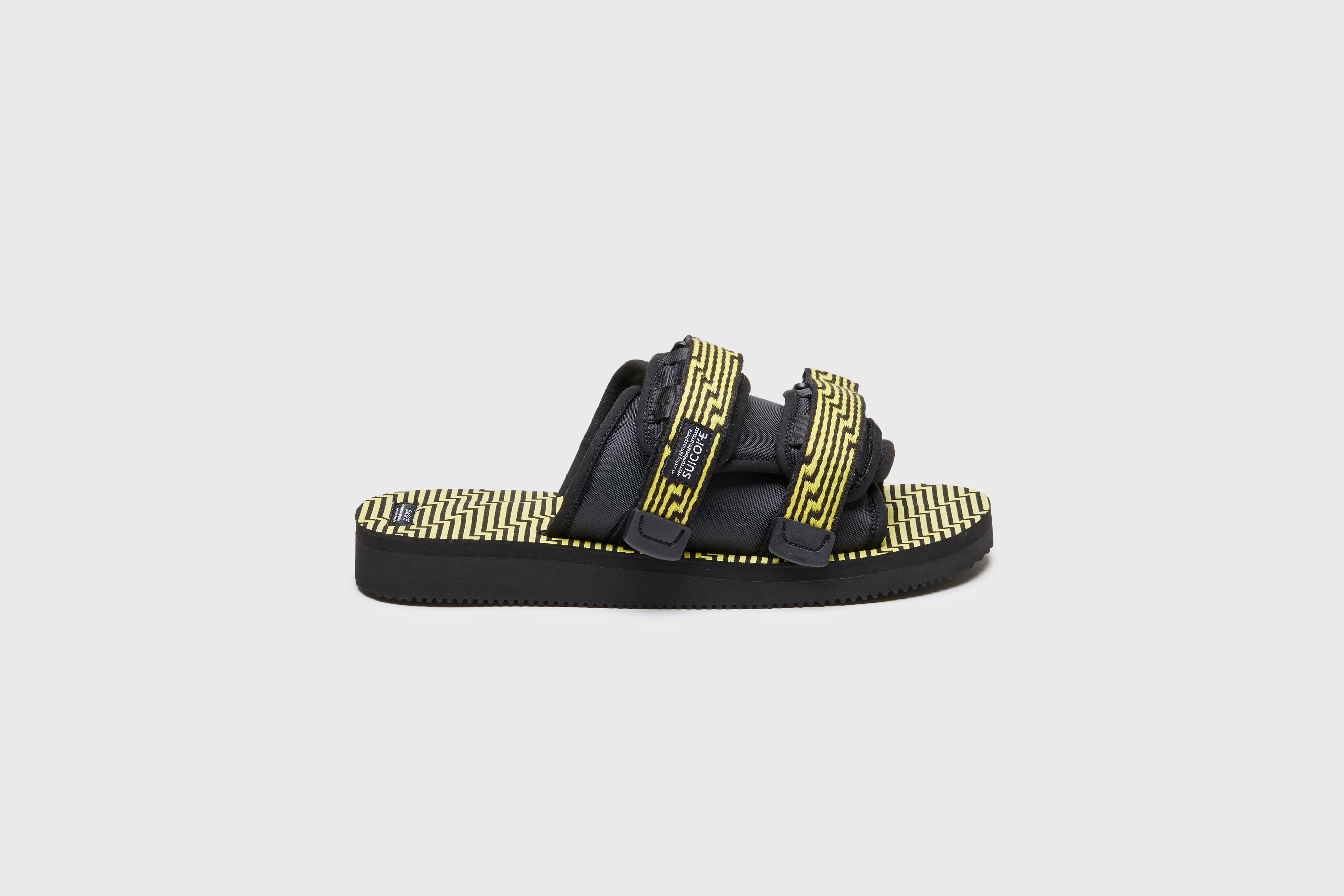 SUICOKE MOTO-JC01 slides with black & yellow nylon and synthetic material  upper, black & yellow midsole and sole, straps and logo patch. From Spring/Summer 2023 collection on eightywingold Web Store, an official partner of SUICOKE. OG-056-JC01 BLACK X YELLOW