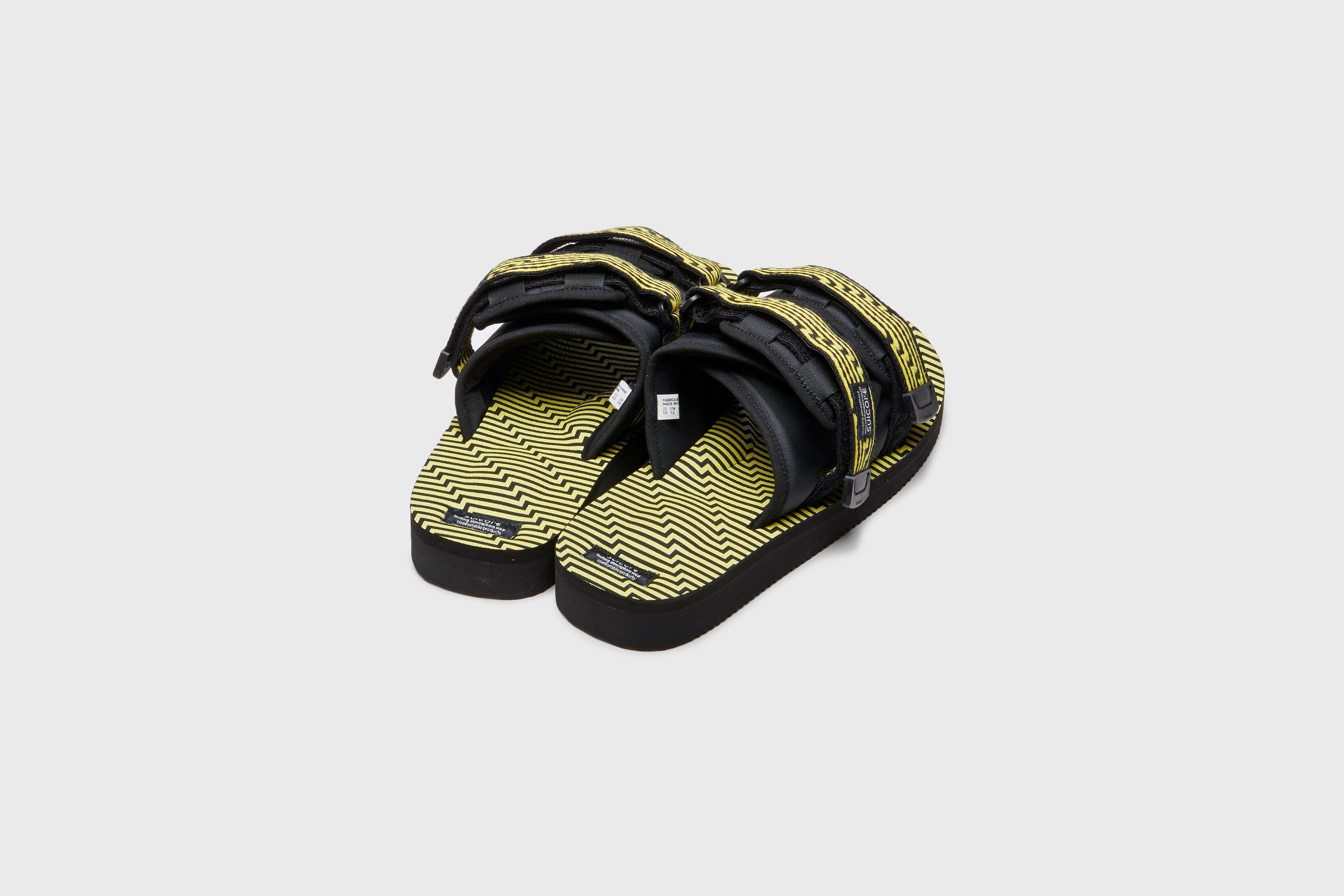 SUICOKE MOTO-JC01 slides with black &amp; yellow nylon and synthetic material  upper, black &amp; yellow midsole and sole, straps and logo patch. From Spring/Summer 2023 collection on eightywingold Web Store, an official partner of SUICOKE. OG-056-JC01 BLACK X YELLOW