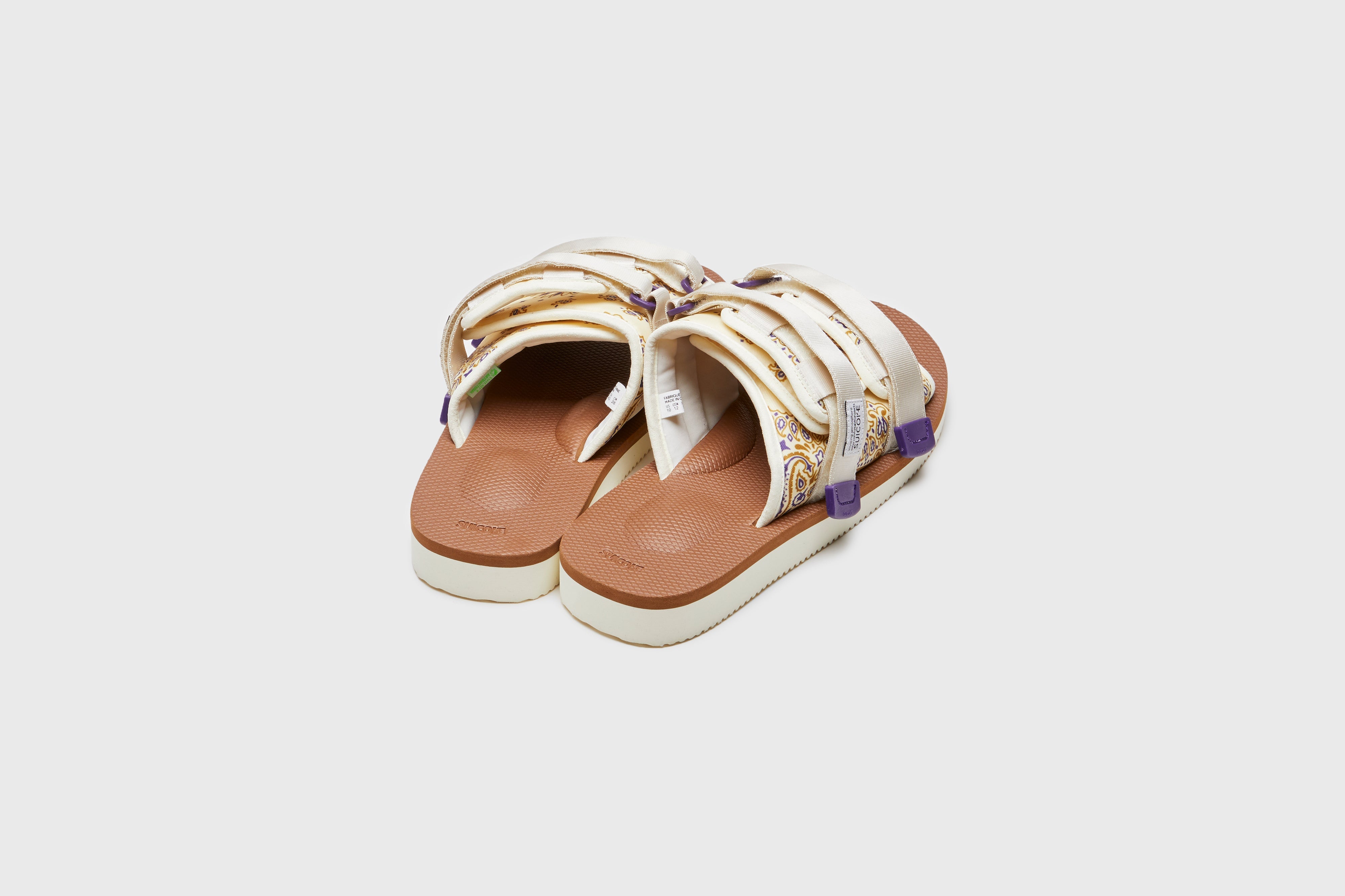 SUICOKE MOTO-Cab-PT05 sandals with ivory & brown nylon upper, ivory & brown midsole and sole, strap and logo patch. From Spring/Summer 2023 collection on eightywingold Web Store, an official partner of SUICOKE. OG-056CAB-PT05 IVORY X BROWN