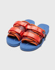 SUICOKE MOTO-Cab-PT06 slides with orange & navy nylon upper, orange & navy midsole and sole, strap and logo patch. From Spring/Summer 2023 collection on eightywingold Web Store, an official partner of SUICOKE. OG-056CAB-PT06 ORANGE X NAVY