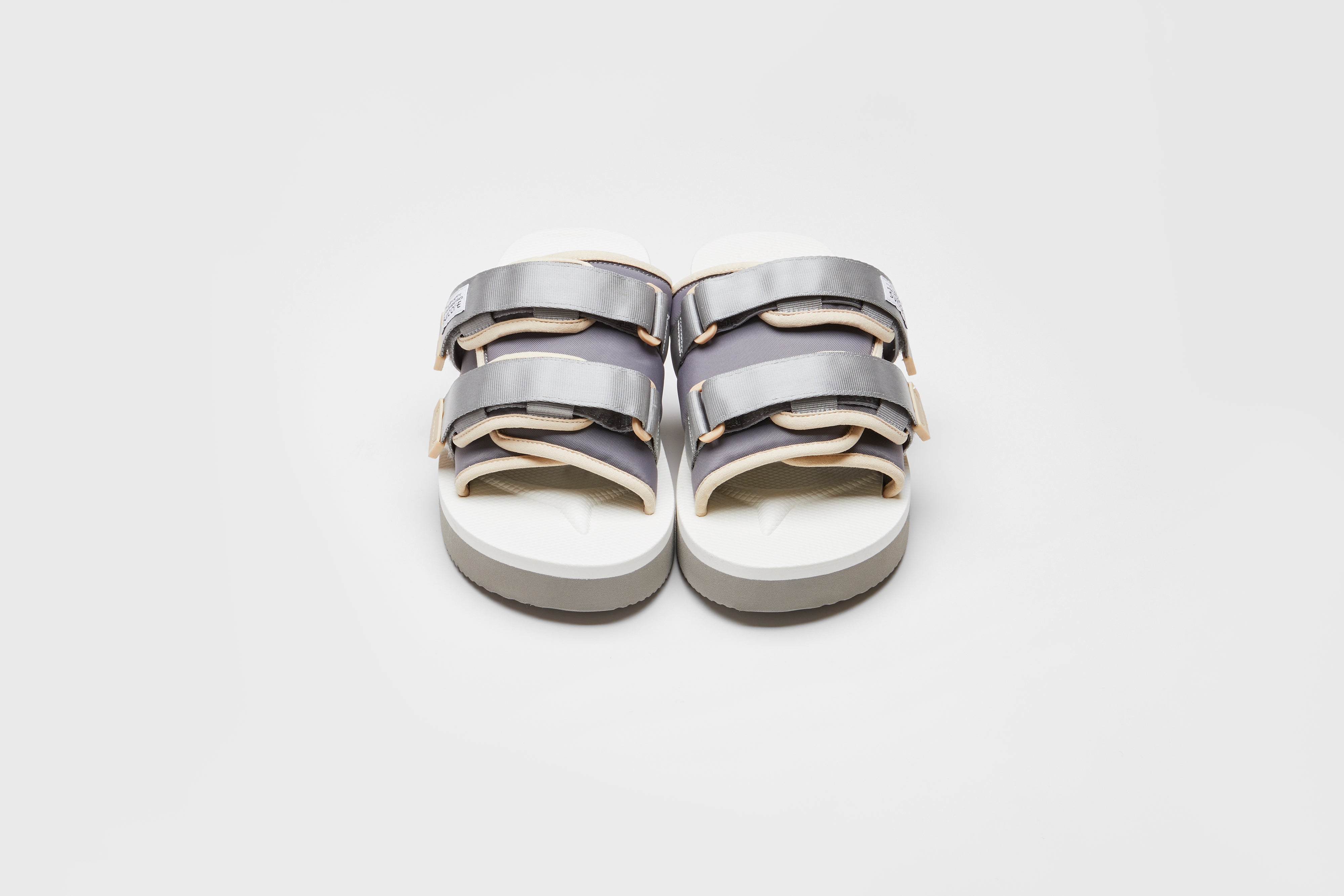 SUICOKE MOTO-PO slides with gray &amp; white nylon upper, gray &amp; white midsole and sole, strap and logo patch. From Spring/Summer 2023 collection on eightywingold Web Store, an official partner of SUICOKE. OG-056PO GRAY X WHITE