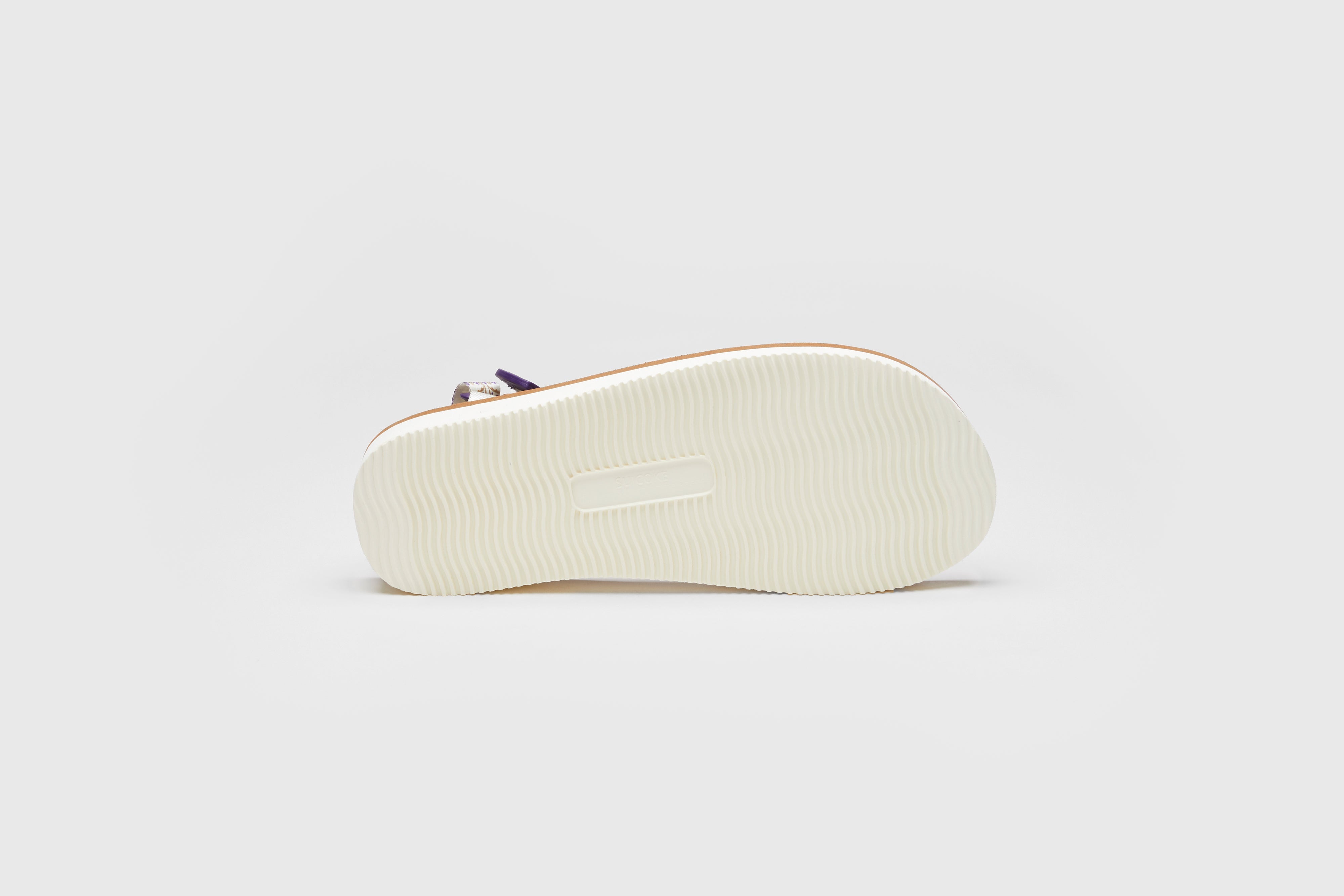 SUICOKE MOTO-PO slides with ivory & brown nylon upper, ivory & brown midsole and sole, strap and logo patch. From Spring/Summer 2023 collection on eightywingold Web Store, an official partner of SUICOKE. OG-056PO IVORY X BROWN