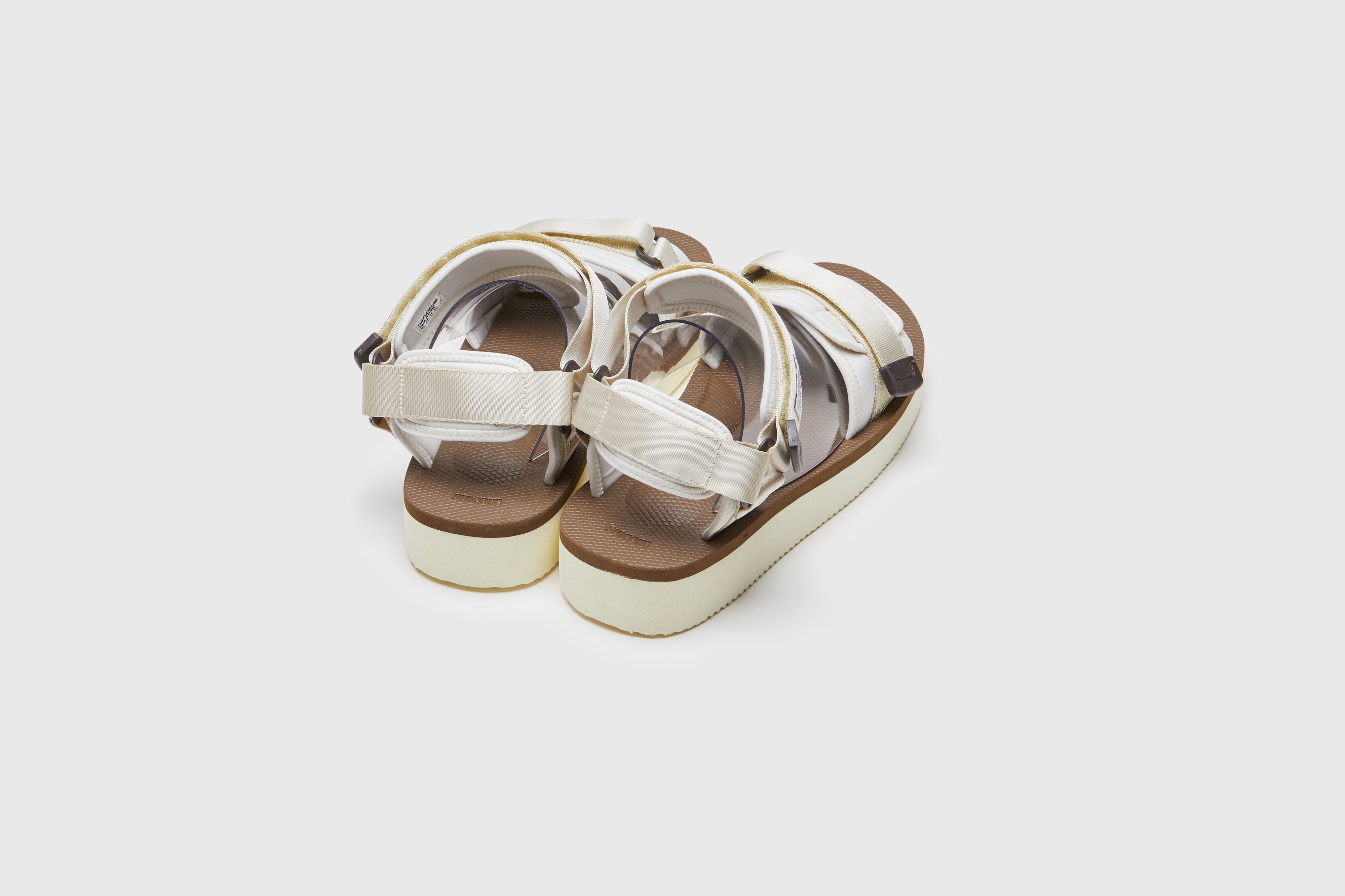 SUICOKE CEL-PO sandals with ivory &amp; brown nylon upper, ivory &amp; brown midsole and sole, strap and logo patch. From Spring/Summer 2023 collection on eightywingold Web Store, an official partner of SUICOKE. OG-022PO IVORY X BROWN