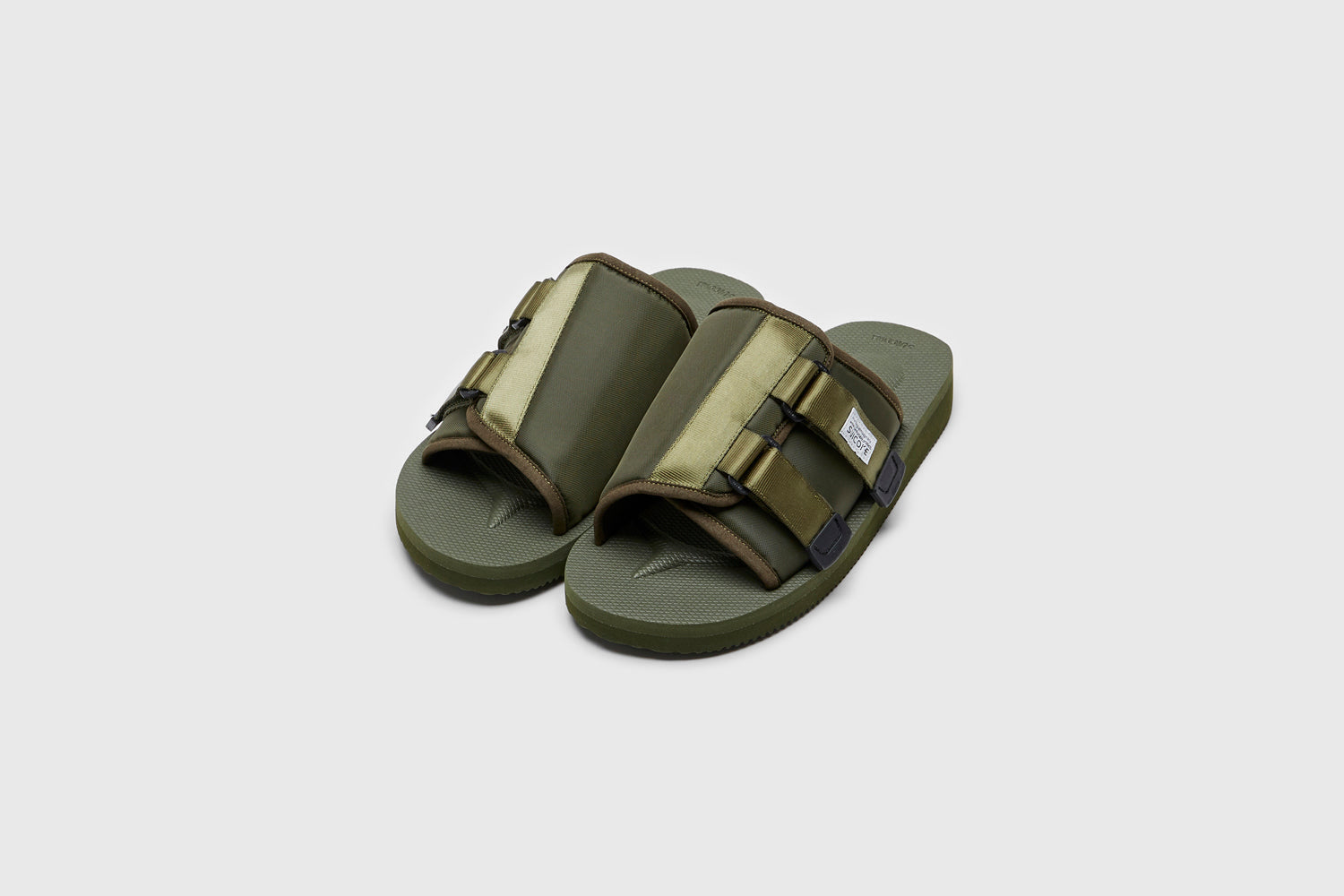 SUICOKE KAW-Cab sandals with olive nylon upper, olive midsole and sole, straps and logo patch. From Spring/Summer 2023 collection on eightywingold Web Store, an official partner of SUICOKE. OG-081CAB OLIVE