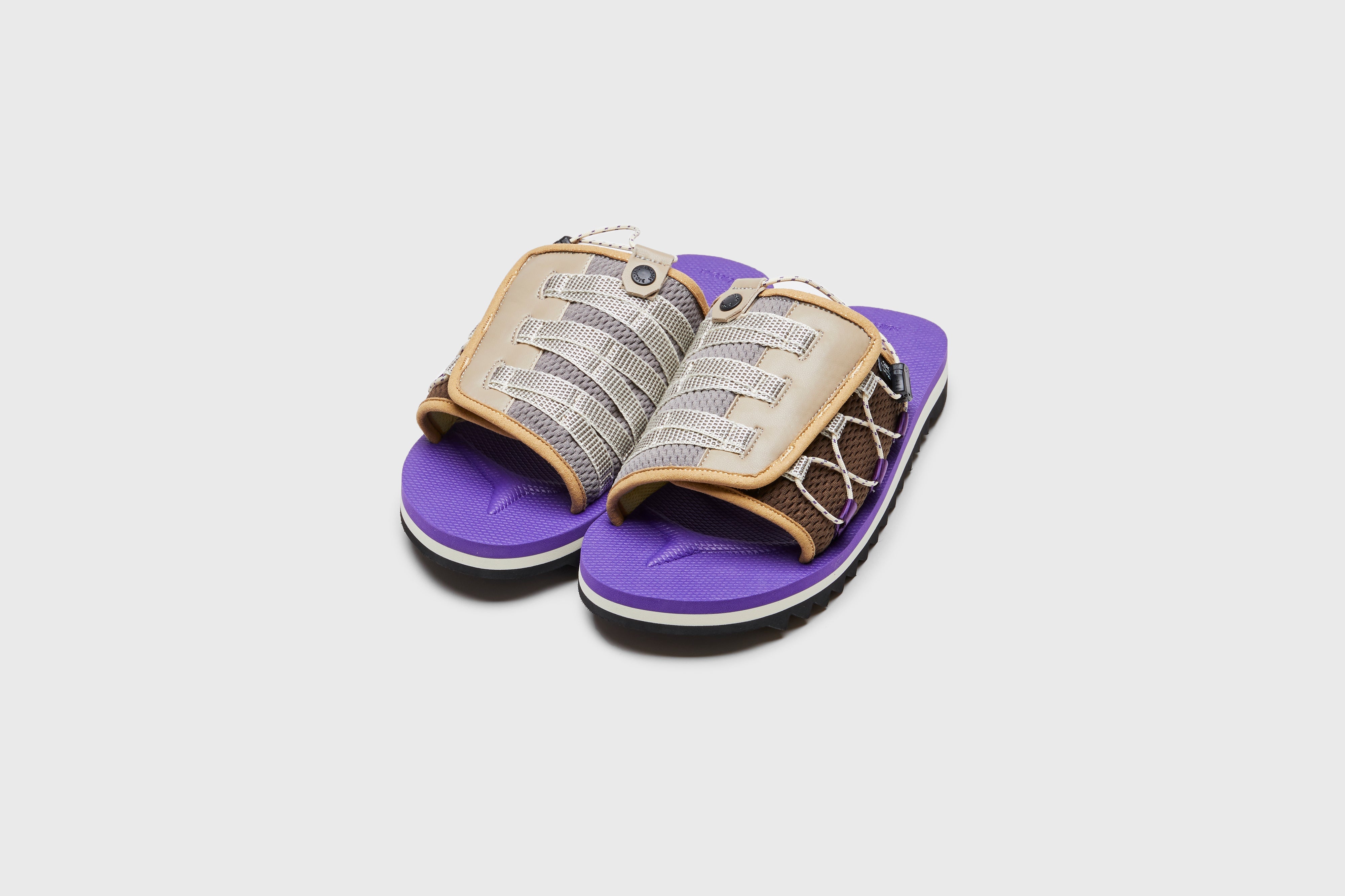 SUICOKE DAO-2AB slides with brown & purple nylon upper, brown & purple midsole and sole, strap and logo patch. From Spring/Summer 2023 collection on eightywingold Web Store, an official partner of SUICOKE. OG-195-2AB BROWN X PURPLE