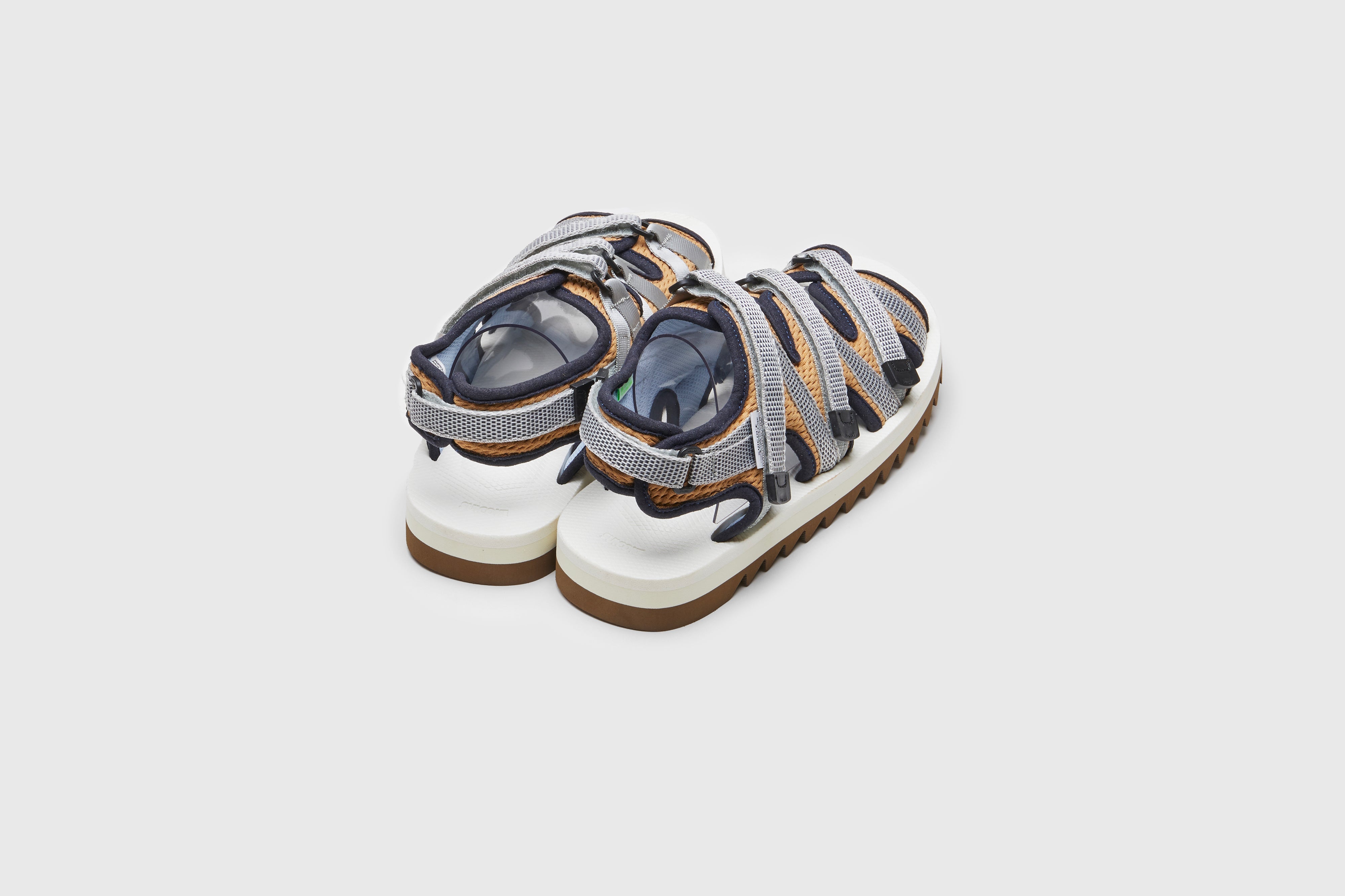 SUICOKE ZIP-ab sandals with navy & white nylon upper, navy & white midsole and sole, strap and logo patch. From Spring/Summer 2023 collection on eightywingold Web Store, an official partner of SUICOKE. OG-229AB NAVY X WHITE