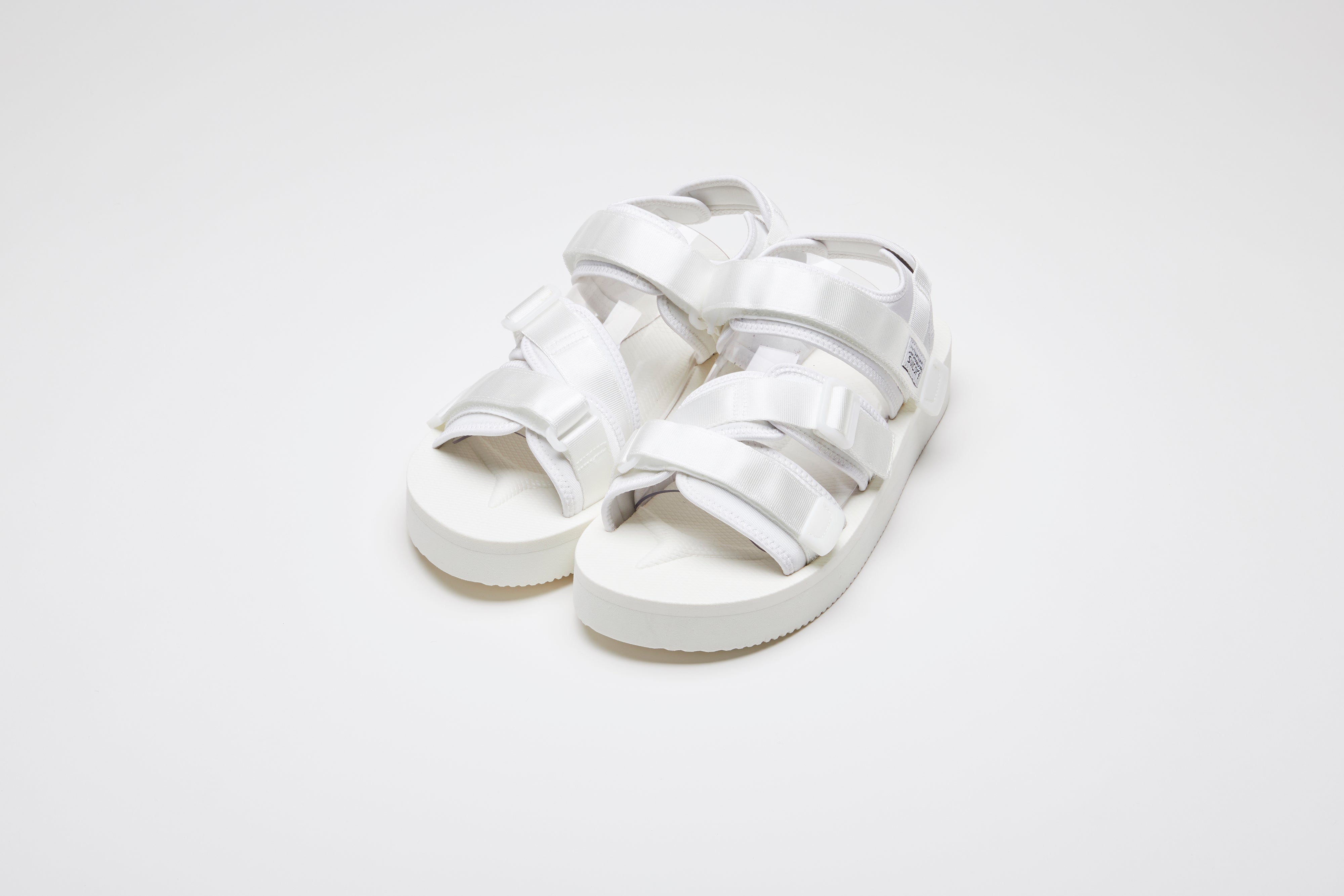 SUICOKE KISEE-PO sandals with white nylon upper, white midsole and sole, strap and logo patch. From Spring/Summer 2023 collection on eightywingold Web Store, an official partner of SUICOKE. OG-044PO WHITE