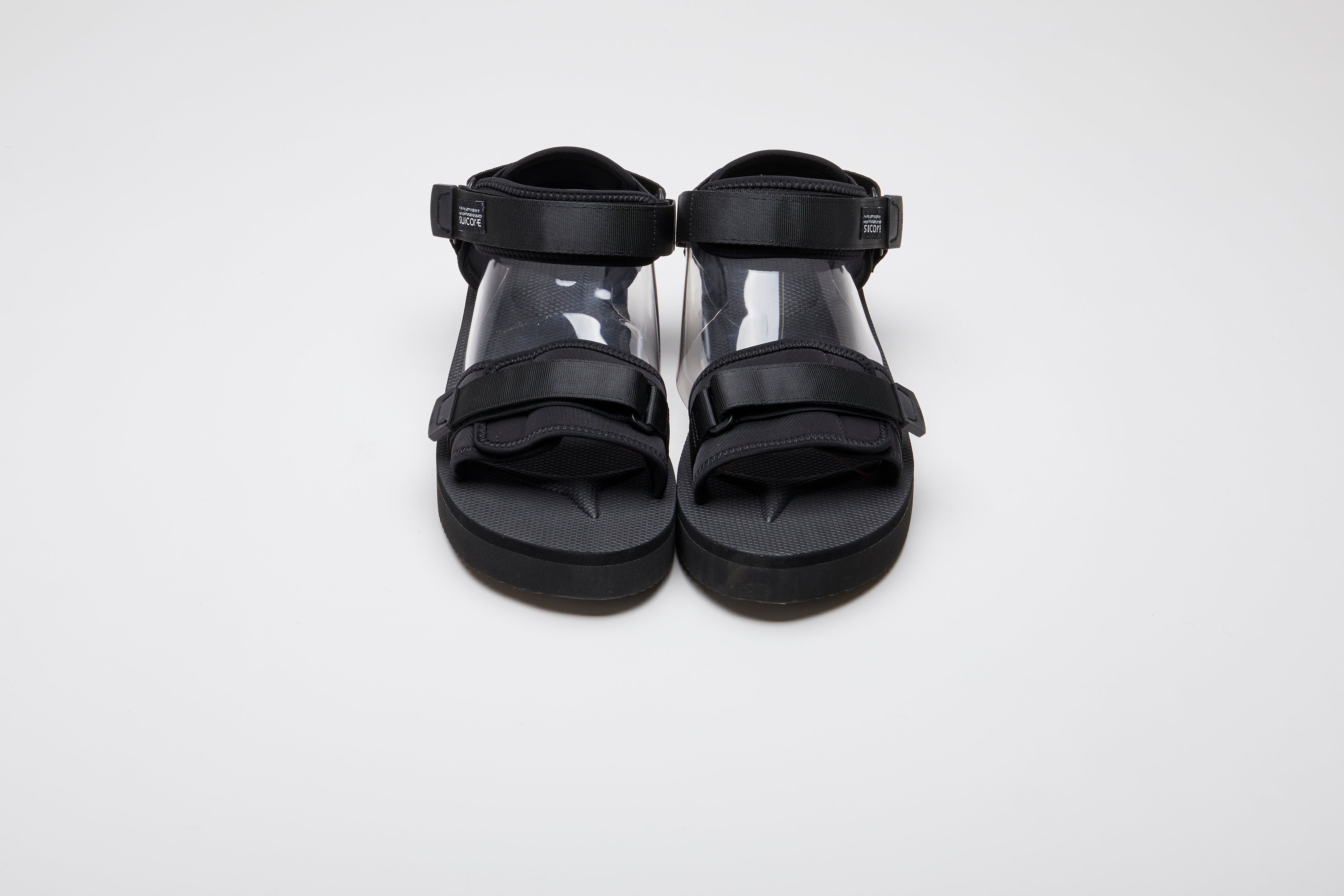 SUICOKE CEL-PO sandals with black nylon upper, black midsole and sole, strap and logo patch. From Spring/Summer 2023 collection on eightywingold Web Store, an official partner of SUICOKE. OG-64PO BLACK